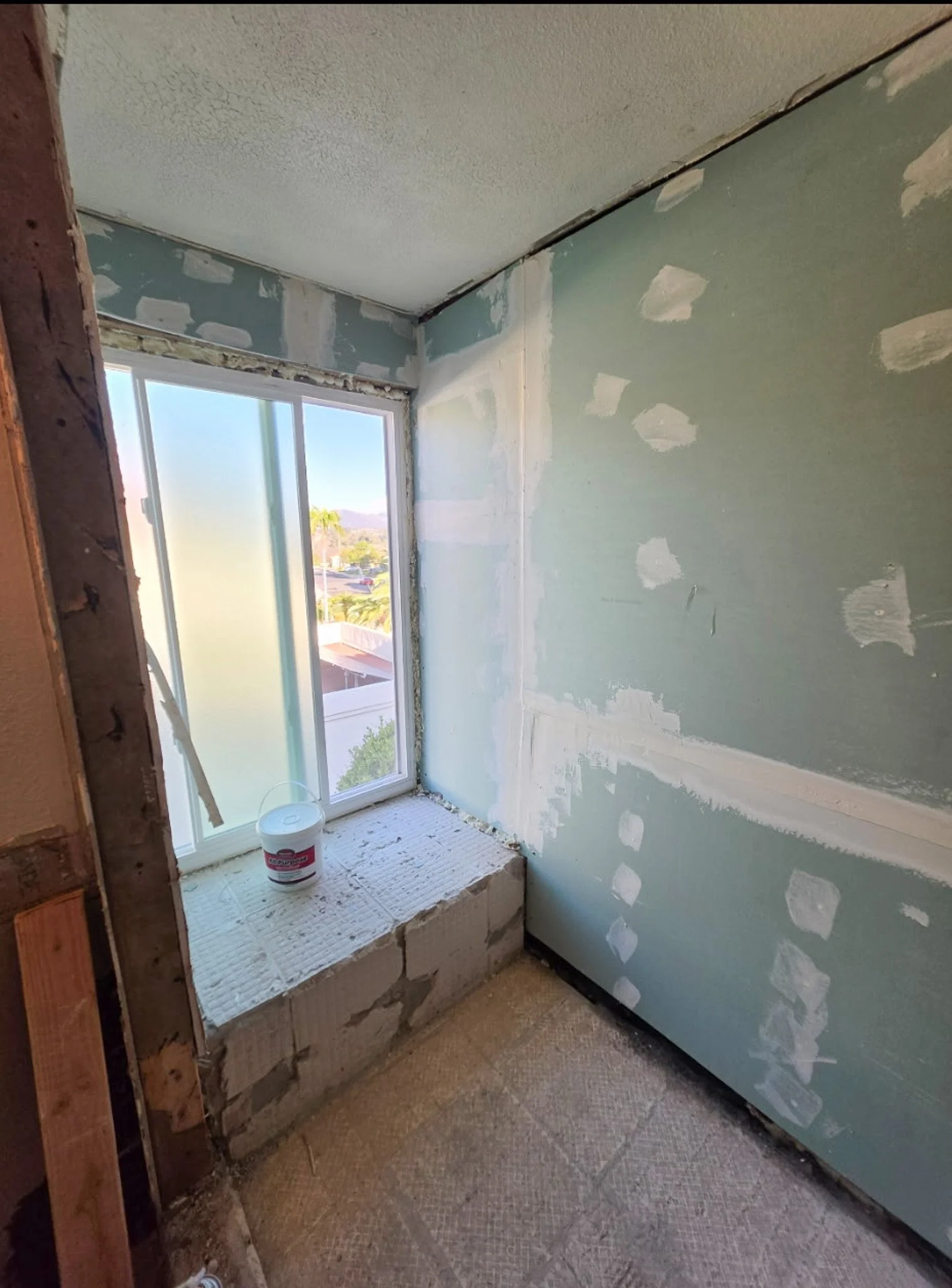 ac-remodeling-shower-bench-framing-moisture-barrier-drywall-sandiego.jpg