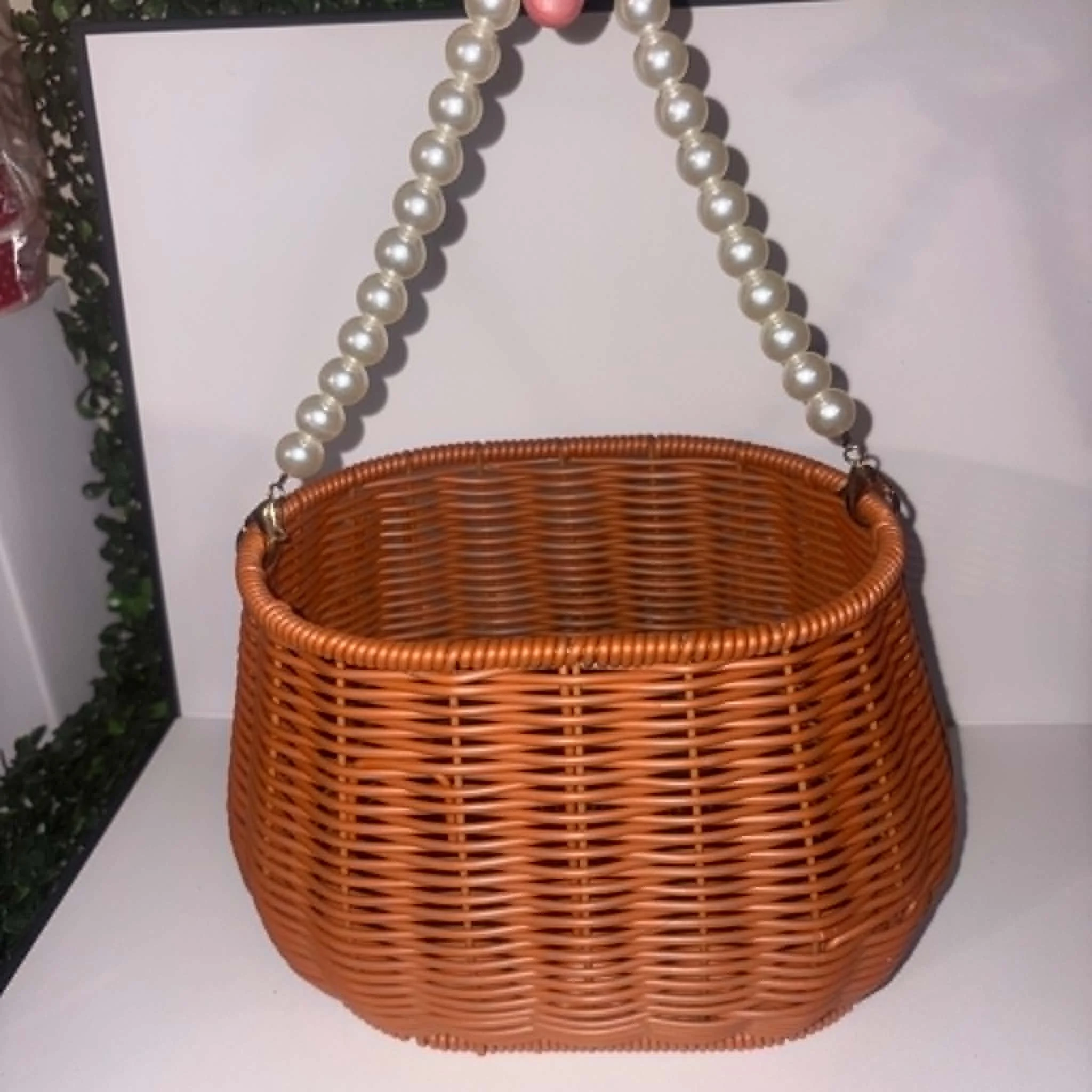 Elegant Pearl-Handled Wicker Basket