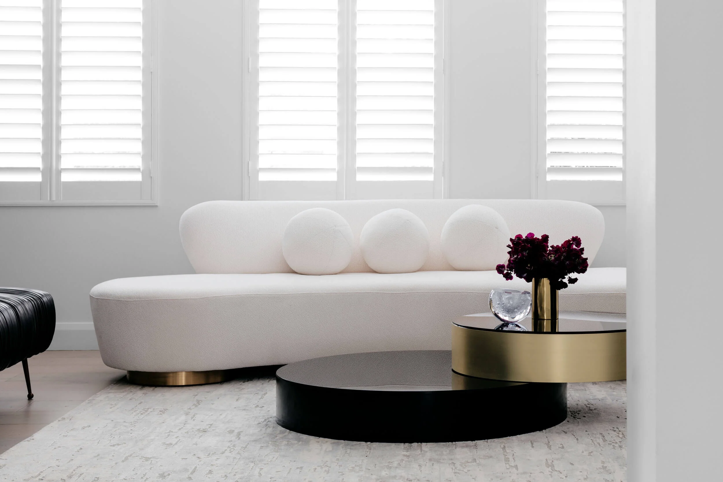 Custom curved coffee table at Rose Bay House