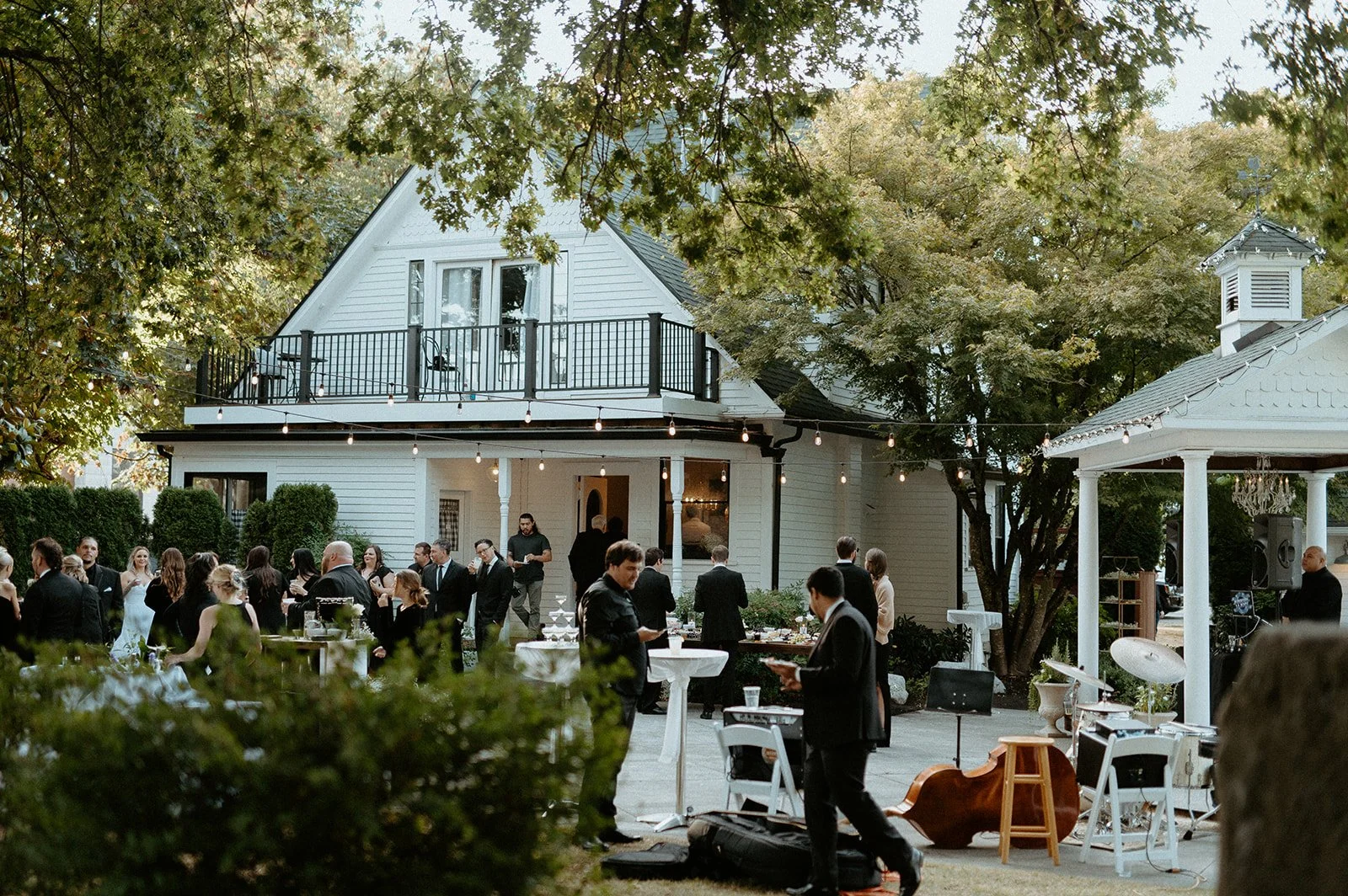 outdoor + wedding + at + The Orting Manor + in + Orting Washington + with + elegant tent reception + and + chandeliers