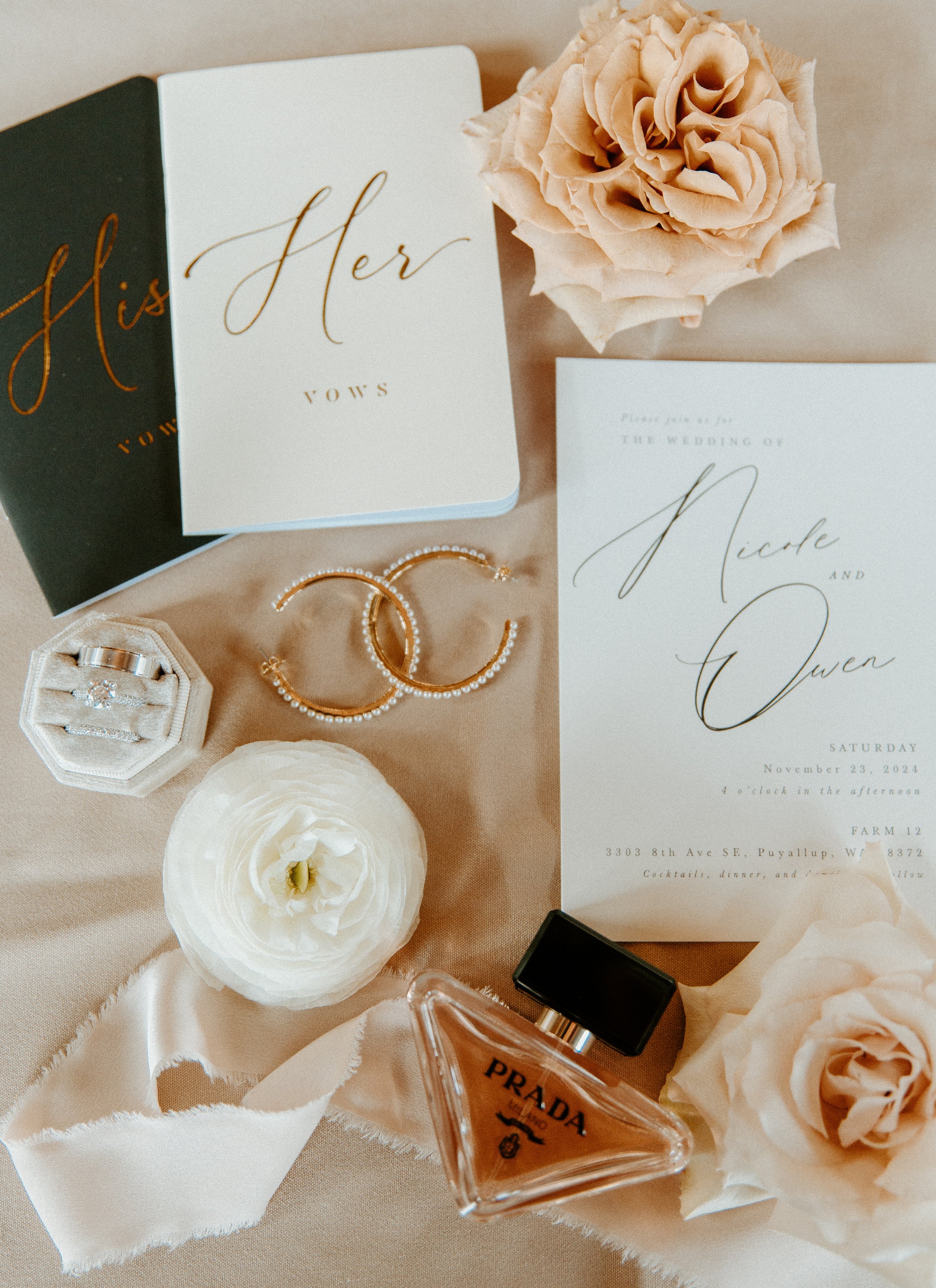 wedding invitation suite rings perfume bridal details flat lay
