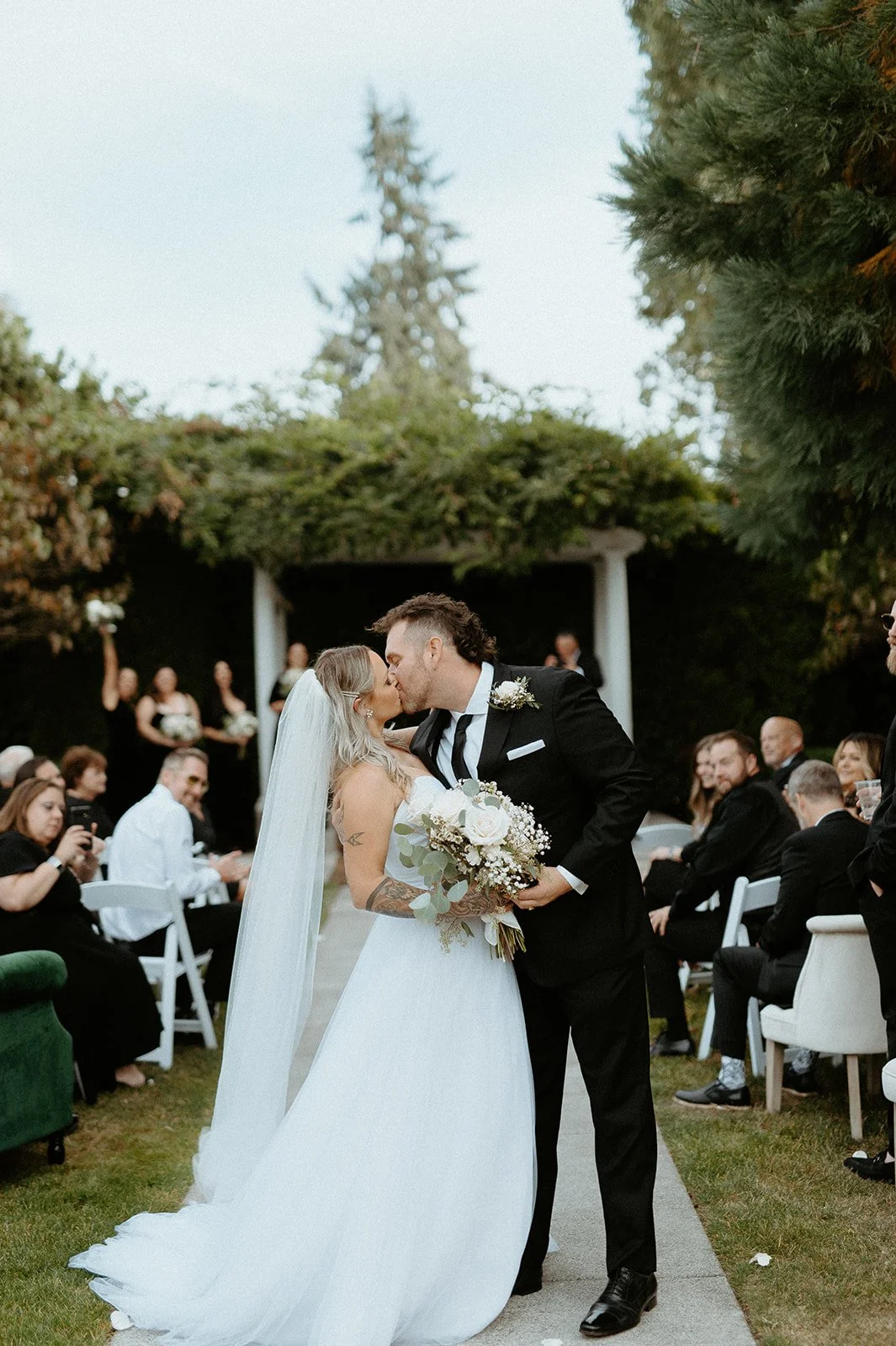 intimate backyard + wedding + in + Orting Washington + with + greenery + and + soft neutral decor