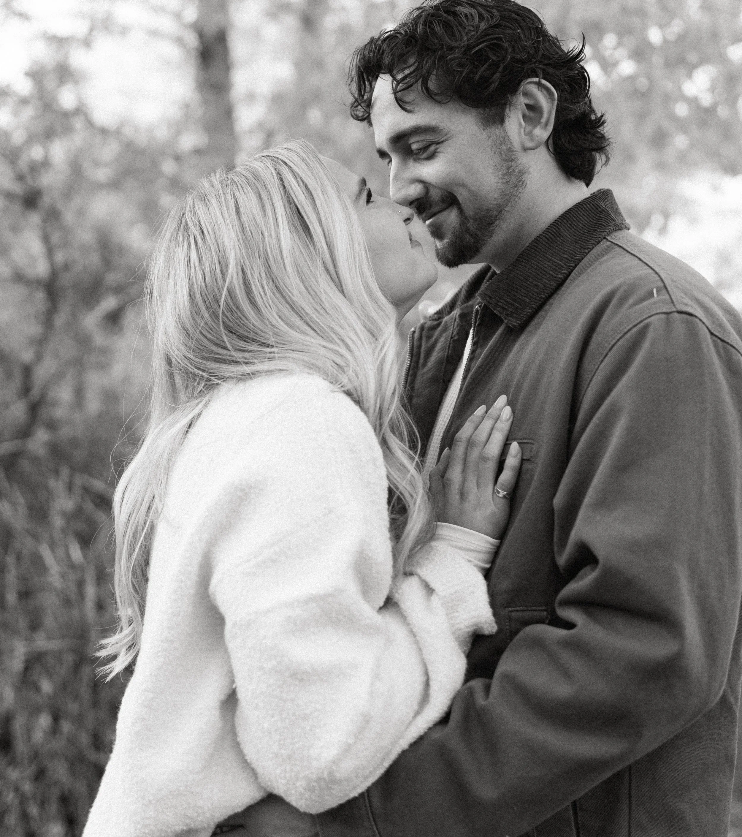 fall engagement photos in Yakima WA + couple smiling at each other + candid moment