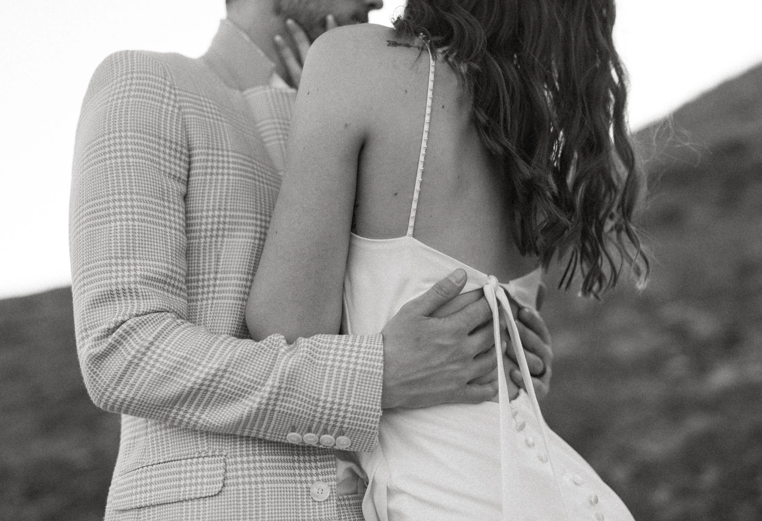 black and white photo of couple cuddling during styled bridal session at Chambers Bay