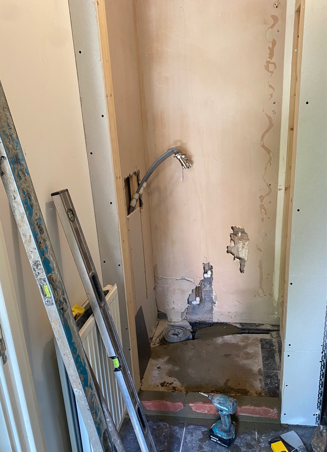 tiled shelf shelving niche bath en-suite shower unit enclosure vanity units white kitchen island renovation plastering flooring electrical tiling metro modern stylish breakfast bar remodel design contractor rewire installer tradesman builder home imp