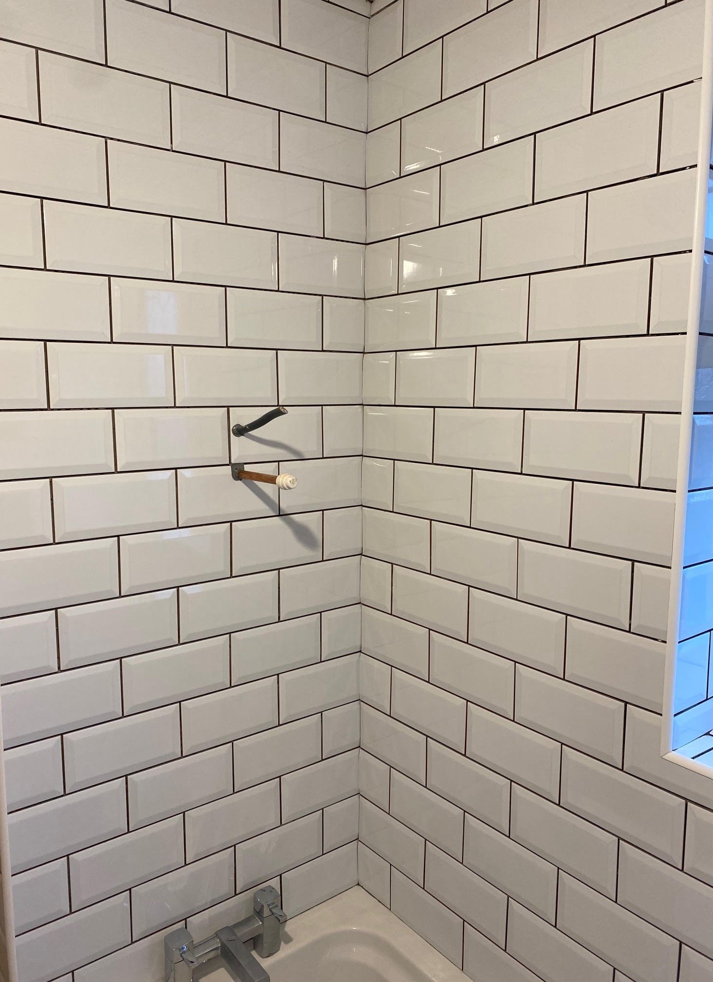 tiled shelf shelving niche bath en-suite shower unit enclosure vanity units white kitchen island renovation plastering flooring electrical tiling metro modern stylish breakfast bar remodel design contractor rewire installer tradesman builder home imp