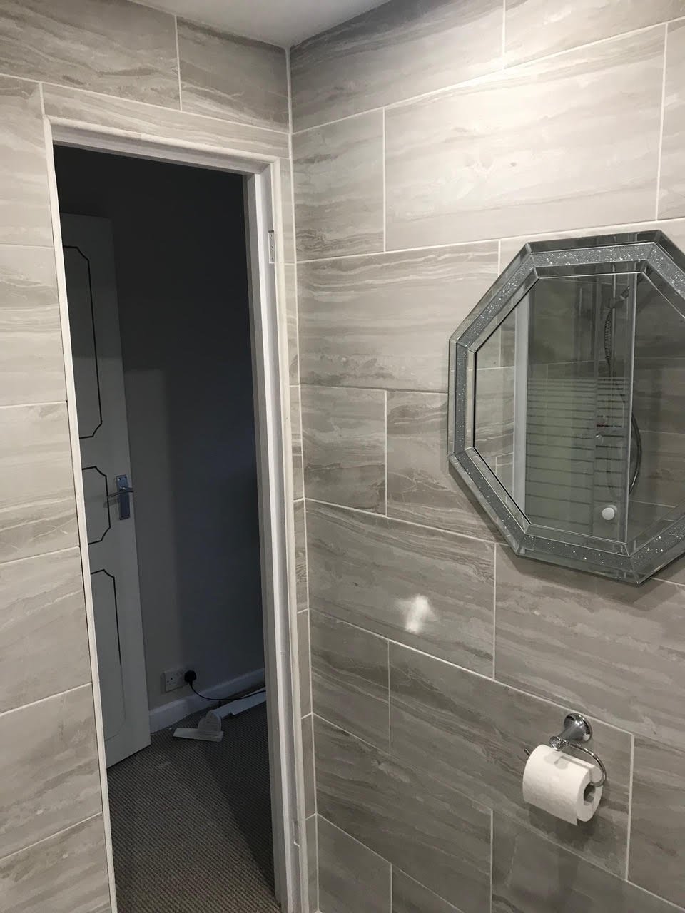 en-suite shower unit enclosure vanity units white kitchen island renovation plastering flooring electrical tiling metro modern stylish breakfast bar remodel design contractor rewire installer tradesman builder home improvement floor leveling worktop