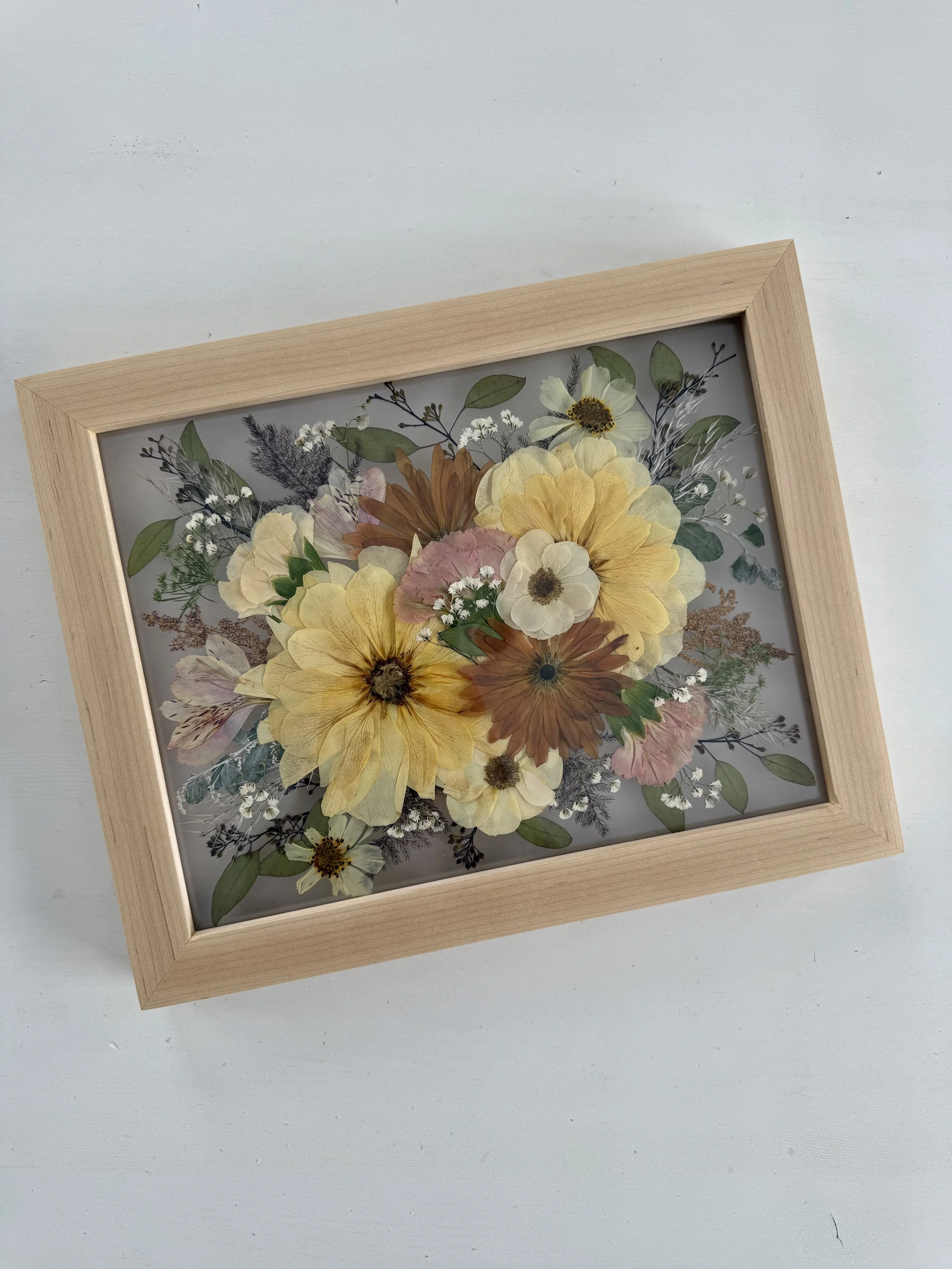 Framed and pressed bridal bouquet.