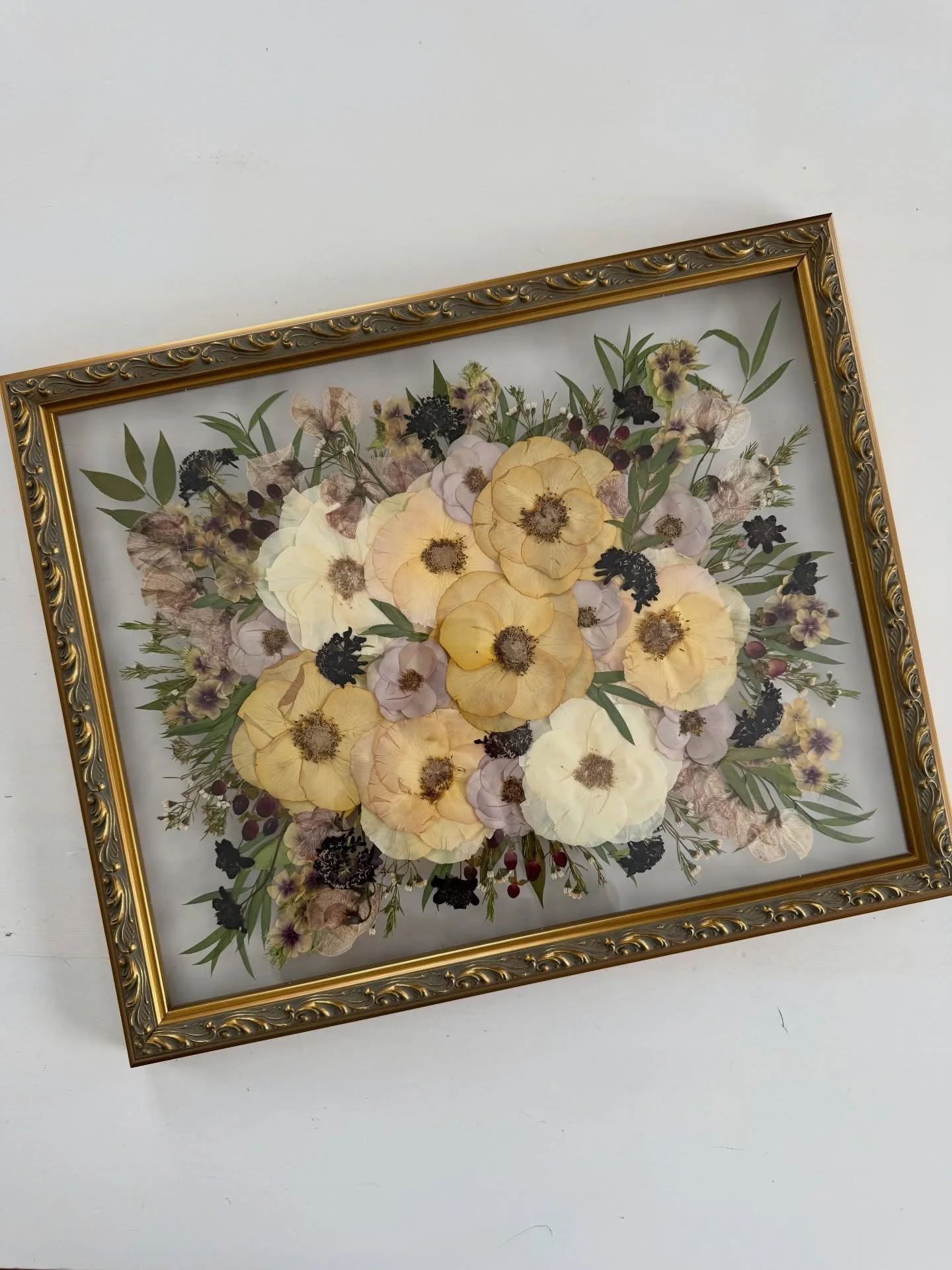 After ➡️ Before!  Created for Kendra ~ 16x20 ornate gold frame, bouquet design, horizontal orientation 💛

Her bouquet had lots of fun filler flowers that added texture and interest to her design!  And the color palette was perfect for our fancy, gol