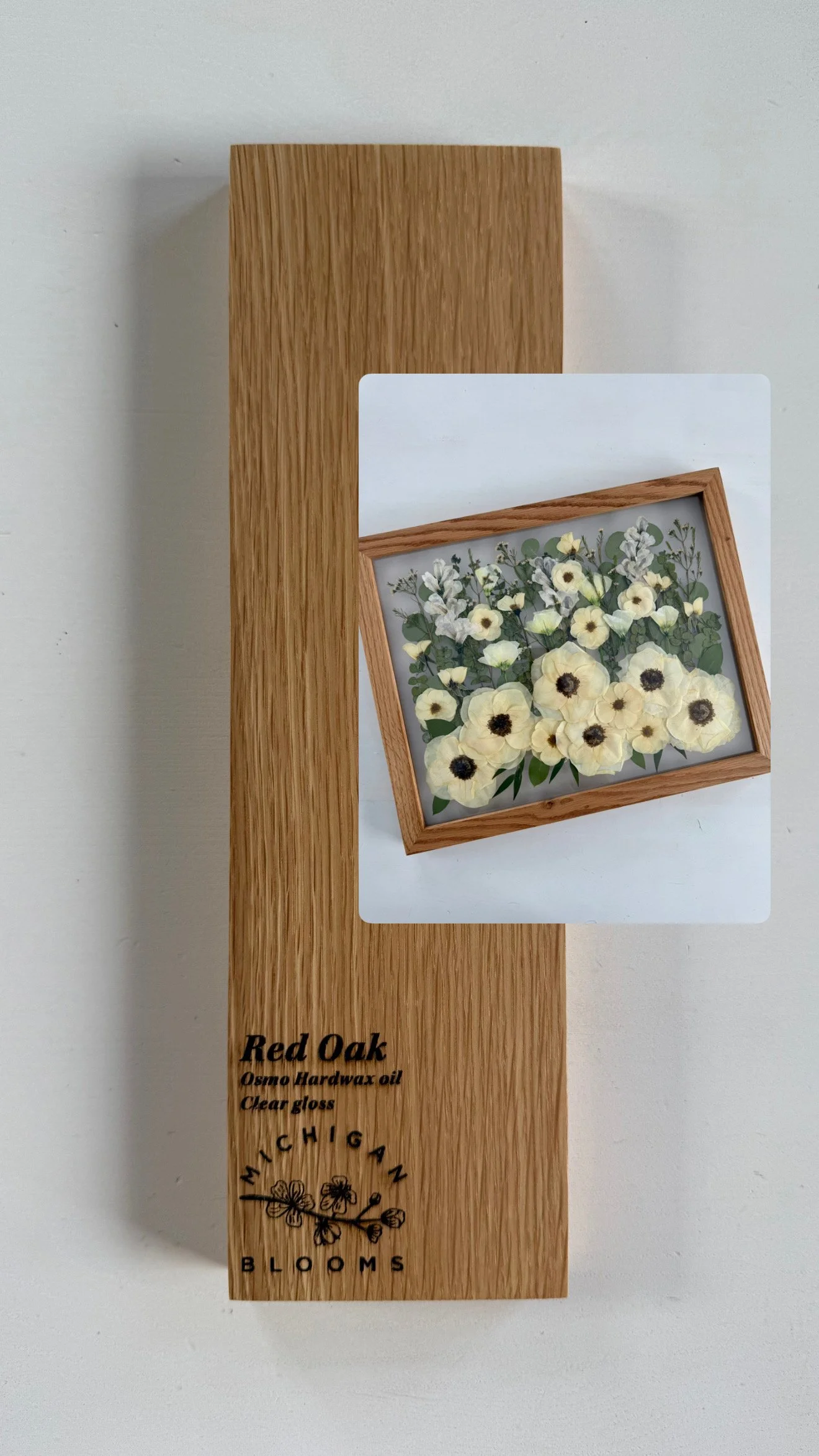 Red oak frame with pressed flowers.