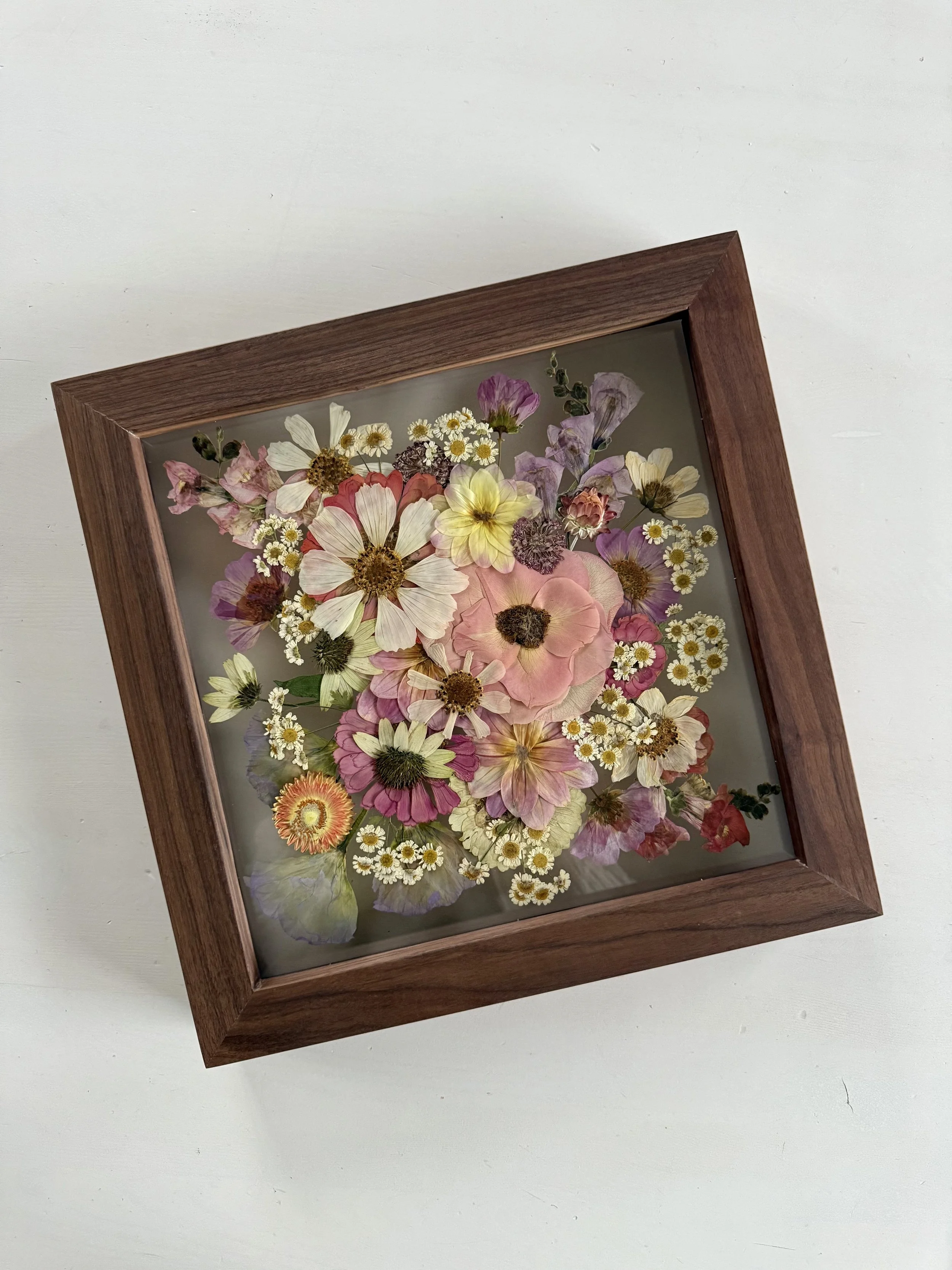 Summer blooms bridal bouquet pressed and preserved in a 12x12 wood frame.