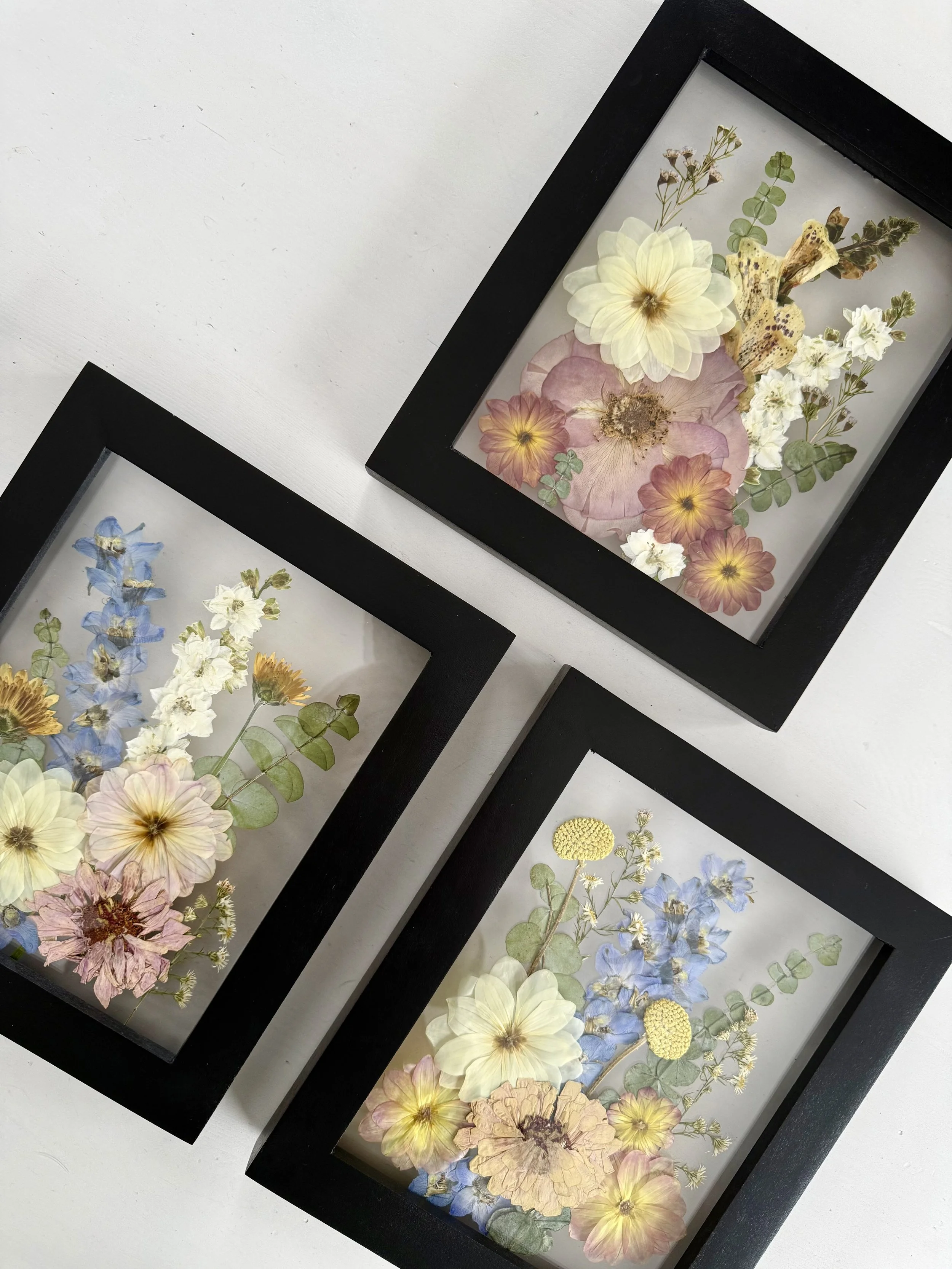 Bridal bouquet pressed and preserved, gallery wall set framed.