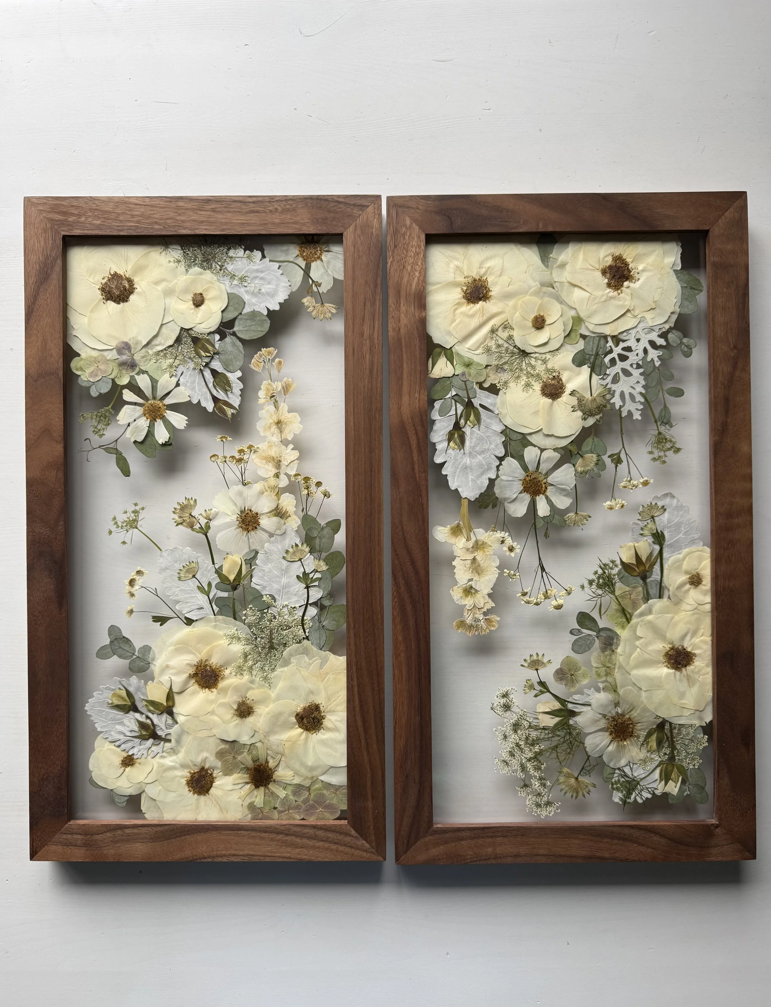 Pressed and framed wedding flowers.