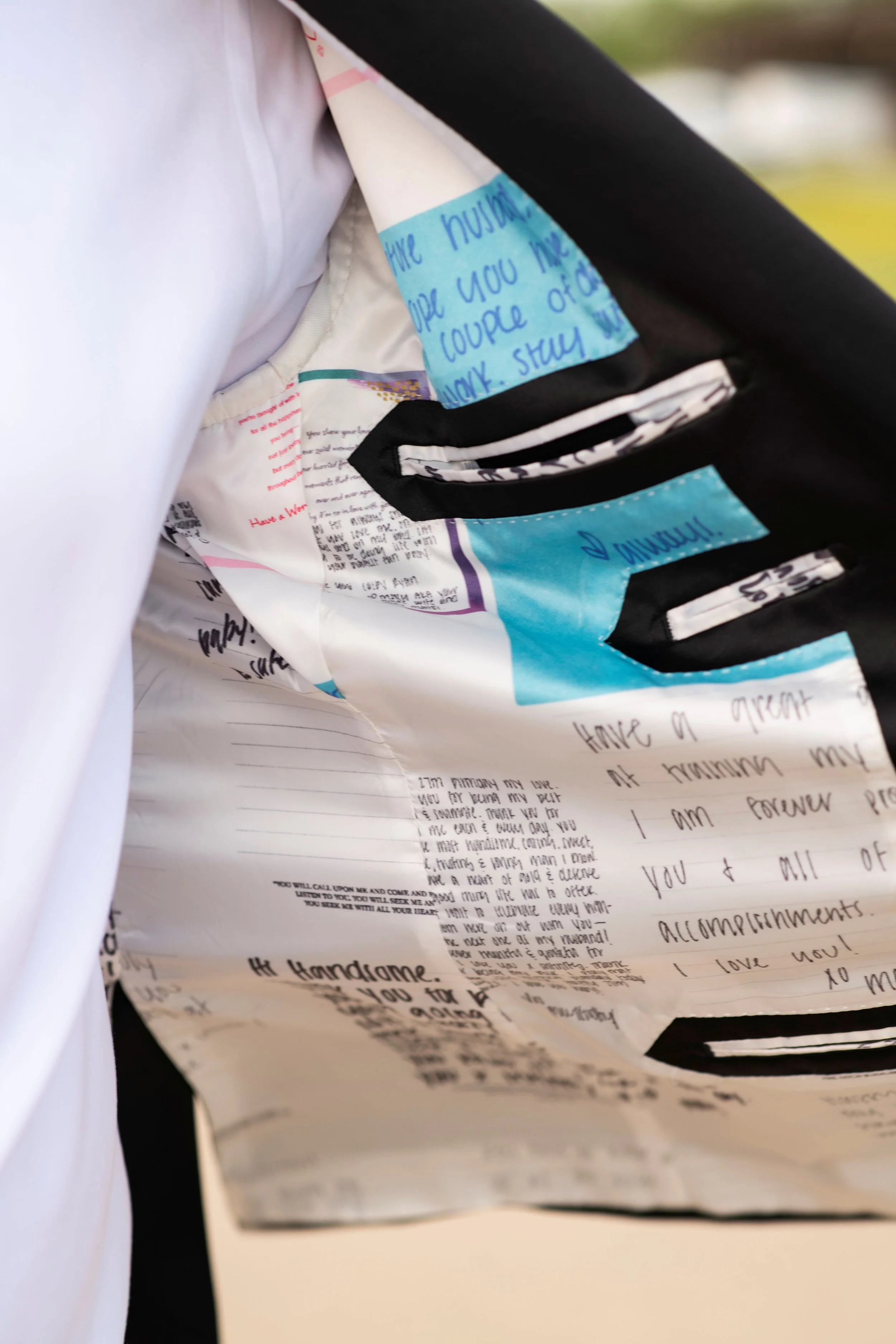 Multiple handwritten notes are scattered and layered on each other, with some visible text such as 'Hello Handmade,' 'I love you,' and phrases like 'Thank you' and 'acceptments.' The notes are on different pieces of paper, some with decorated edges.