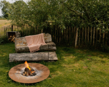 Summer evening with fire pit and blanket