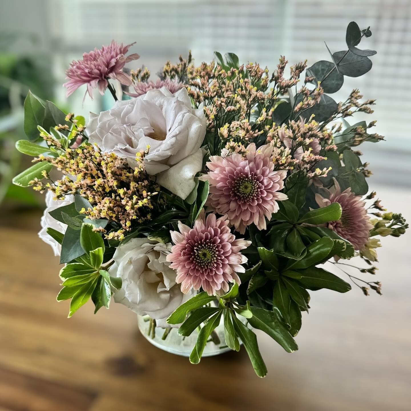 It&rsquo;s spring, baby. And she pretty in pink.

You&rsquo;re looking at a prototype for a job &mdash; white roses, dark pink mums, sea lavender, variegated pittosporum, and eucalyptus. It smells dreamy!

#austinflowers #texasflowers #atxflorist #au