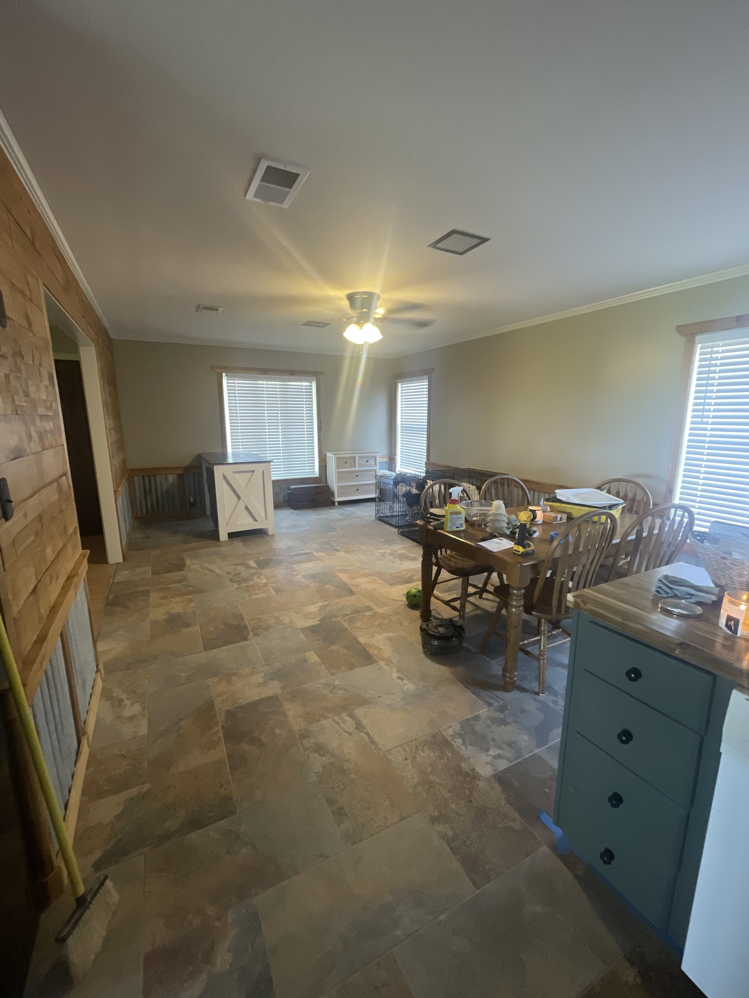 Full Room Renovation: Drywall Installation, Rustin Tin Accents, and Tile installation.