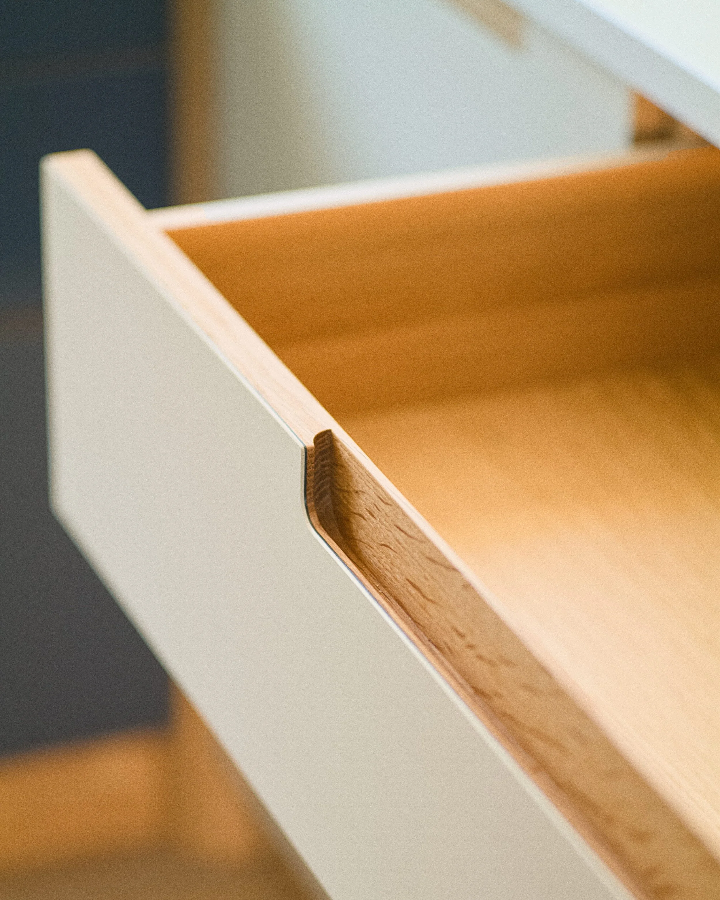 Open kitchen drawer showing dovetailed American white oak drawer box construction