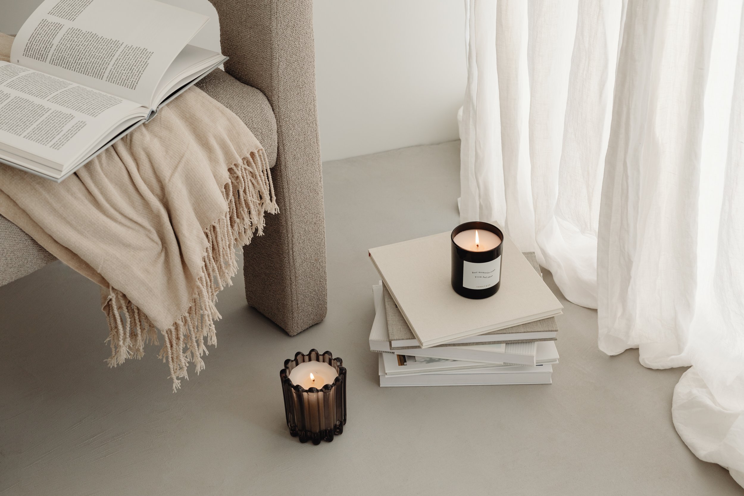 kaboompics_home-decorations-beige-armchair-candles-book-blanket-32090.jpg