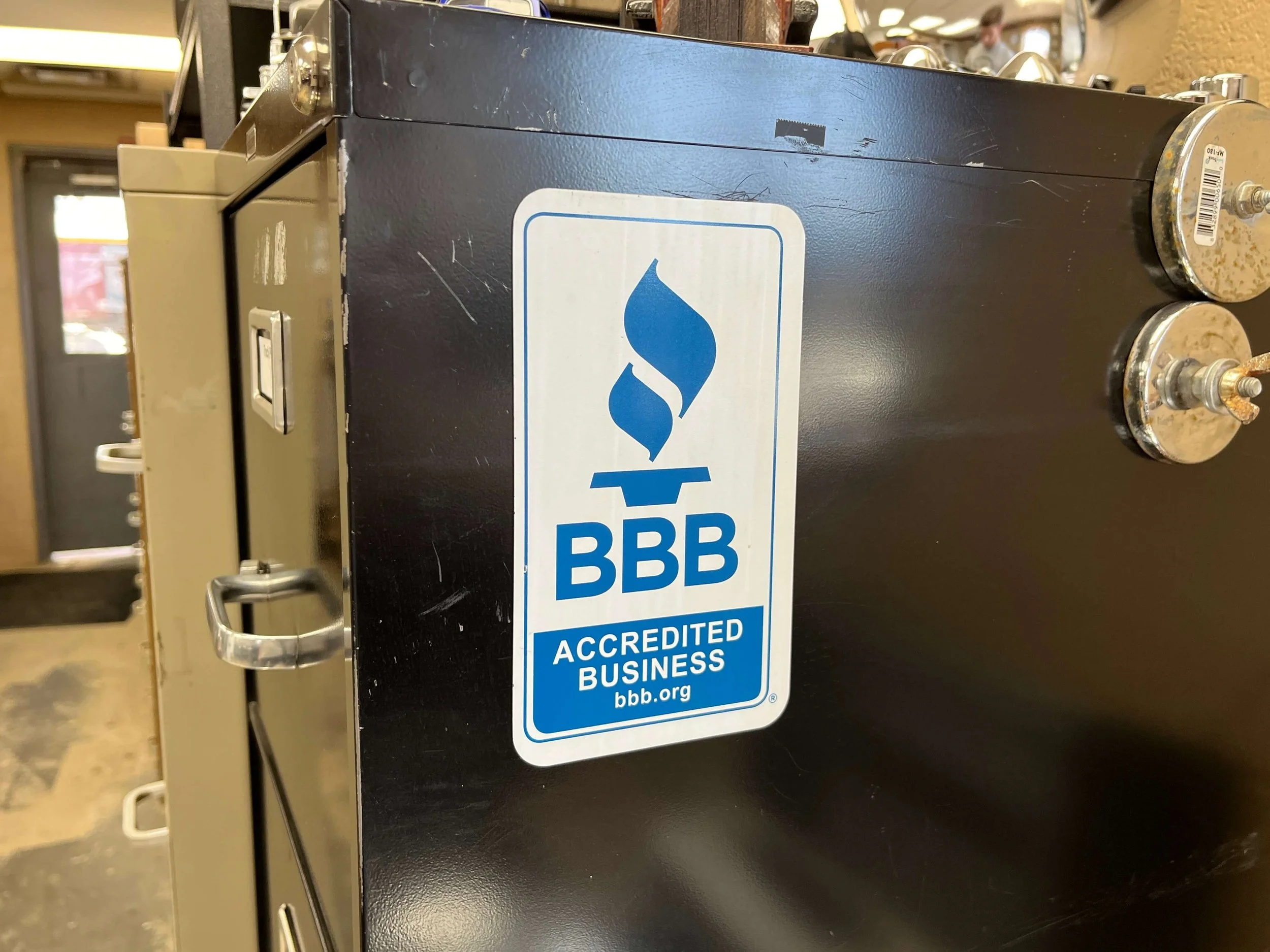 Metal filing cabinet with BBB Accredited Business sticker