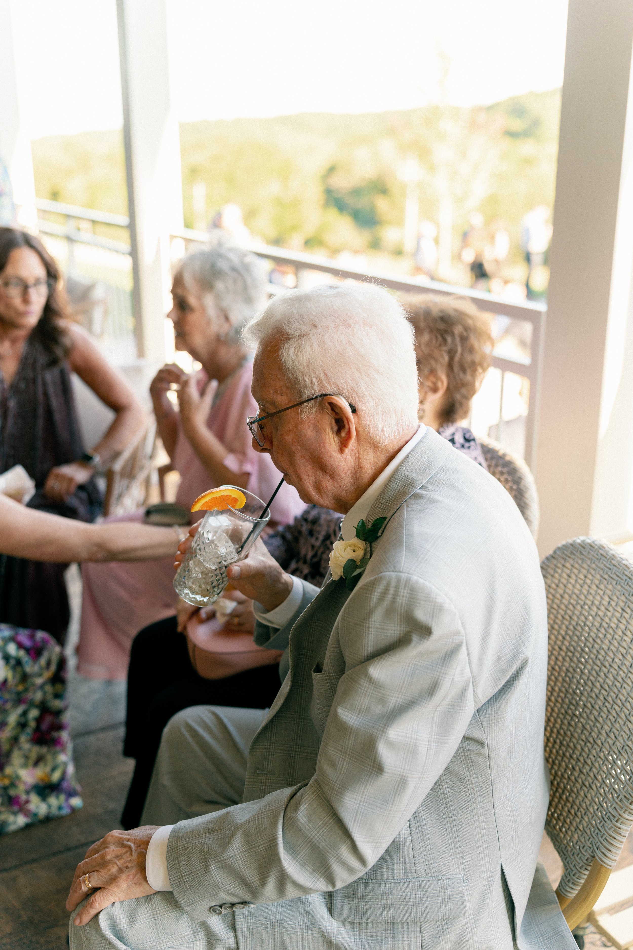 Grandpa sipping his drink