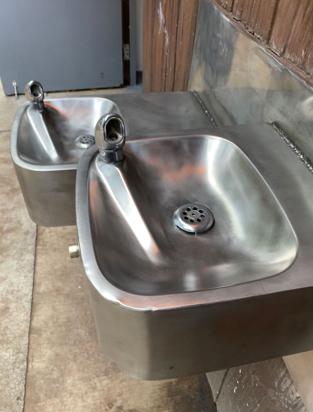 Freshly wire-brushed water fountains