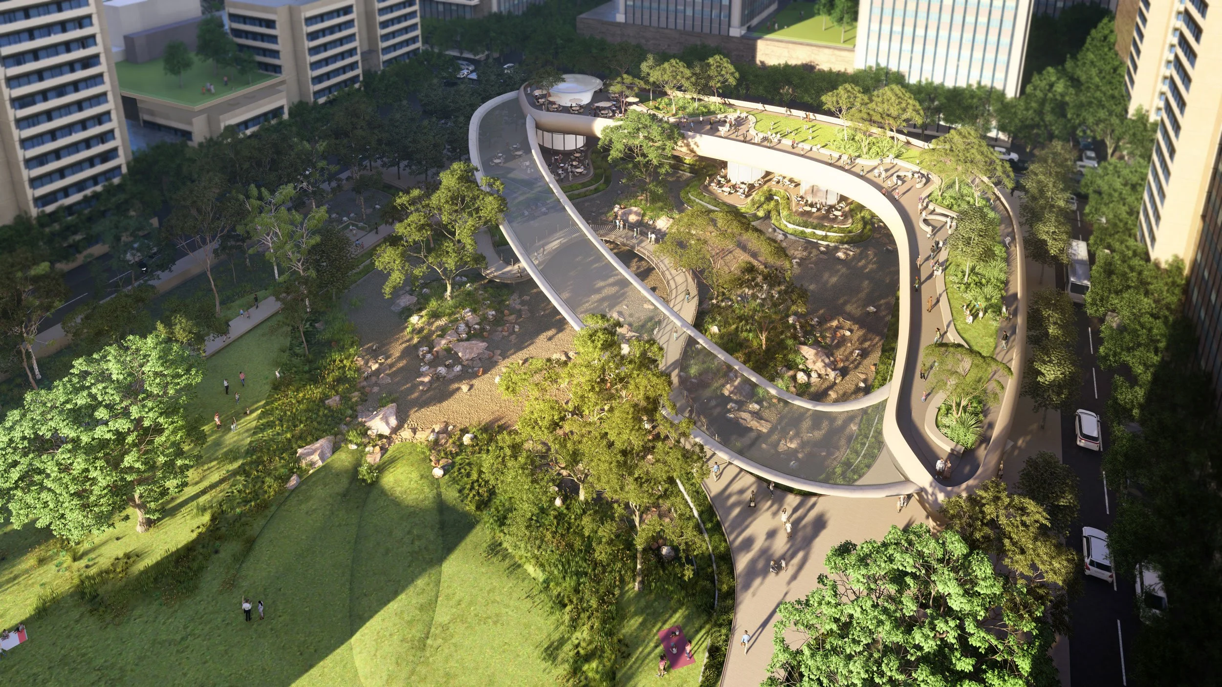 Aerial view of a modern urban park with winding pathways, green landscaped areas, trees, and people walking and relaxing among high-rise buildings.