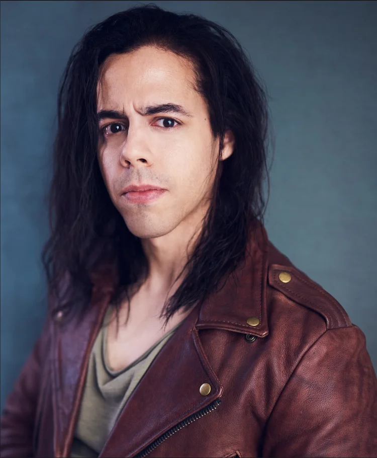 Francisco Marquez intense brown jacket headshot