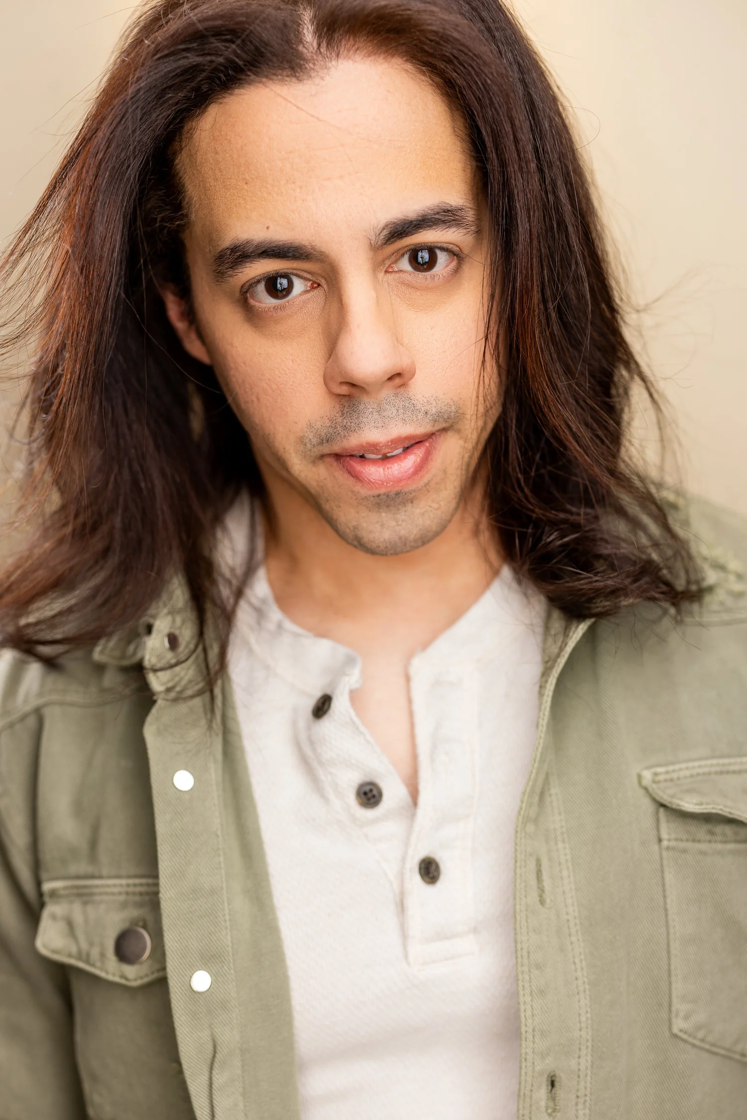 Francisco Marquez actor headshot in green jacket