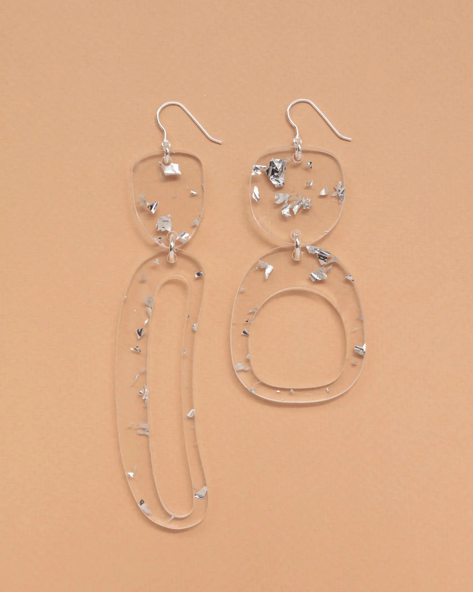 Silver flakes earrings, $70 through warrenstevescott.com.
