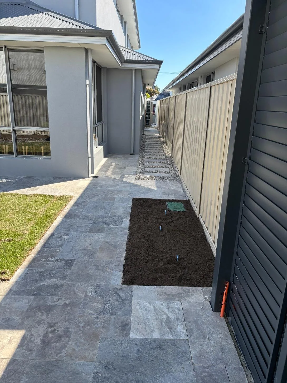landscaping, paving, travertine pavers, lawn, reticulation, stones and steppers