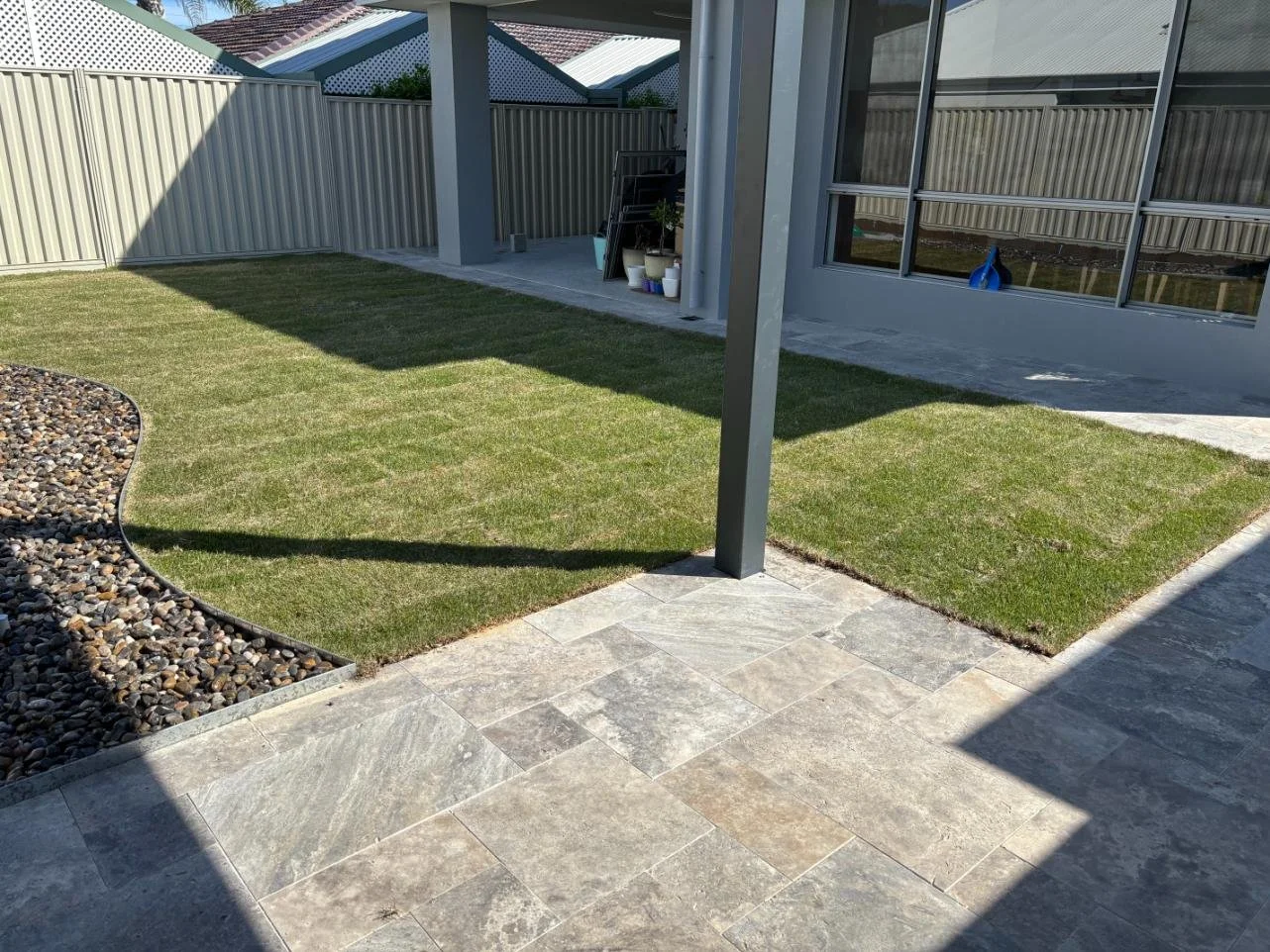 paving, travertine paving, natural lawn, reticulation, curved edging