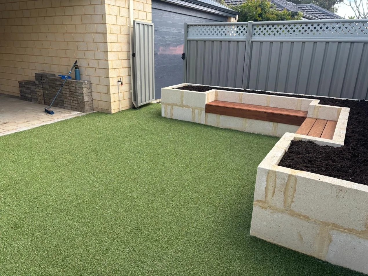 outdoor transformation, raised garden bed, bench seat, artificial lawn
