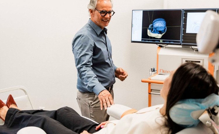 Dr. Reitano providing Transcranial Magnetic Stimulation (TMS), a Twin Lakes, Las Vegas TRD therapy option.