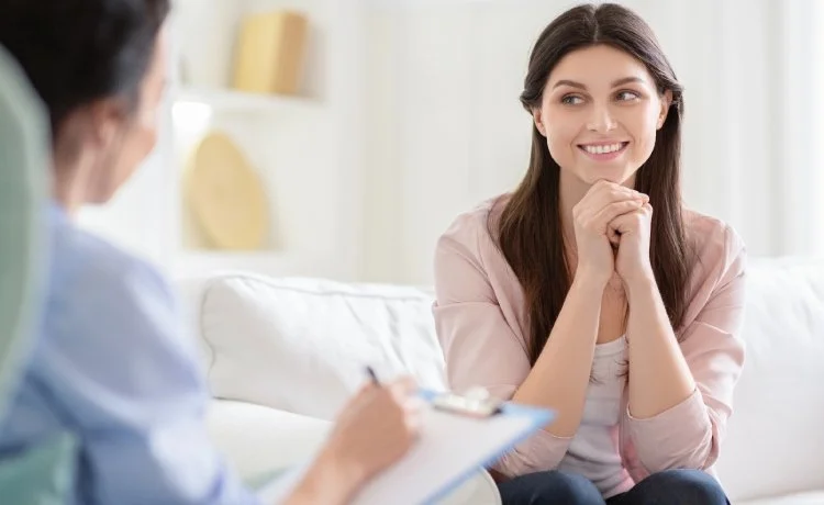 A female patient talking to a therapist as part of panic disorder treatment near Summit Hills, Las Vegas, Nevada.