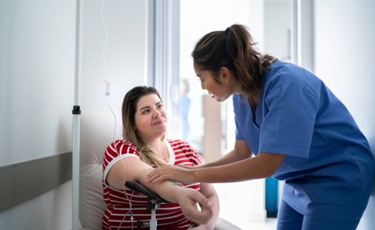 A woman in chair receiving a Ketamine IV, one of the treatment-resistant anxiety therapies near Henderson, NV.