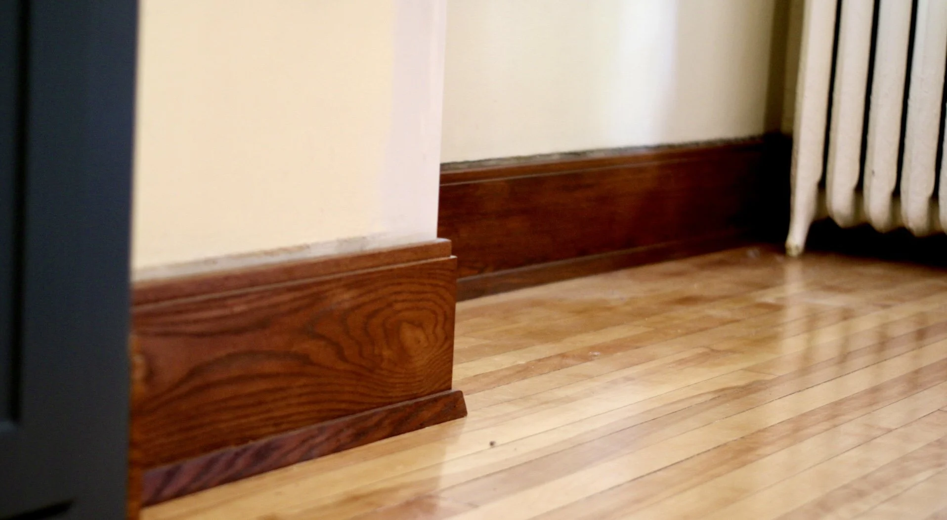 Trimmed and stained baseboard 