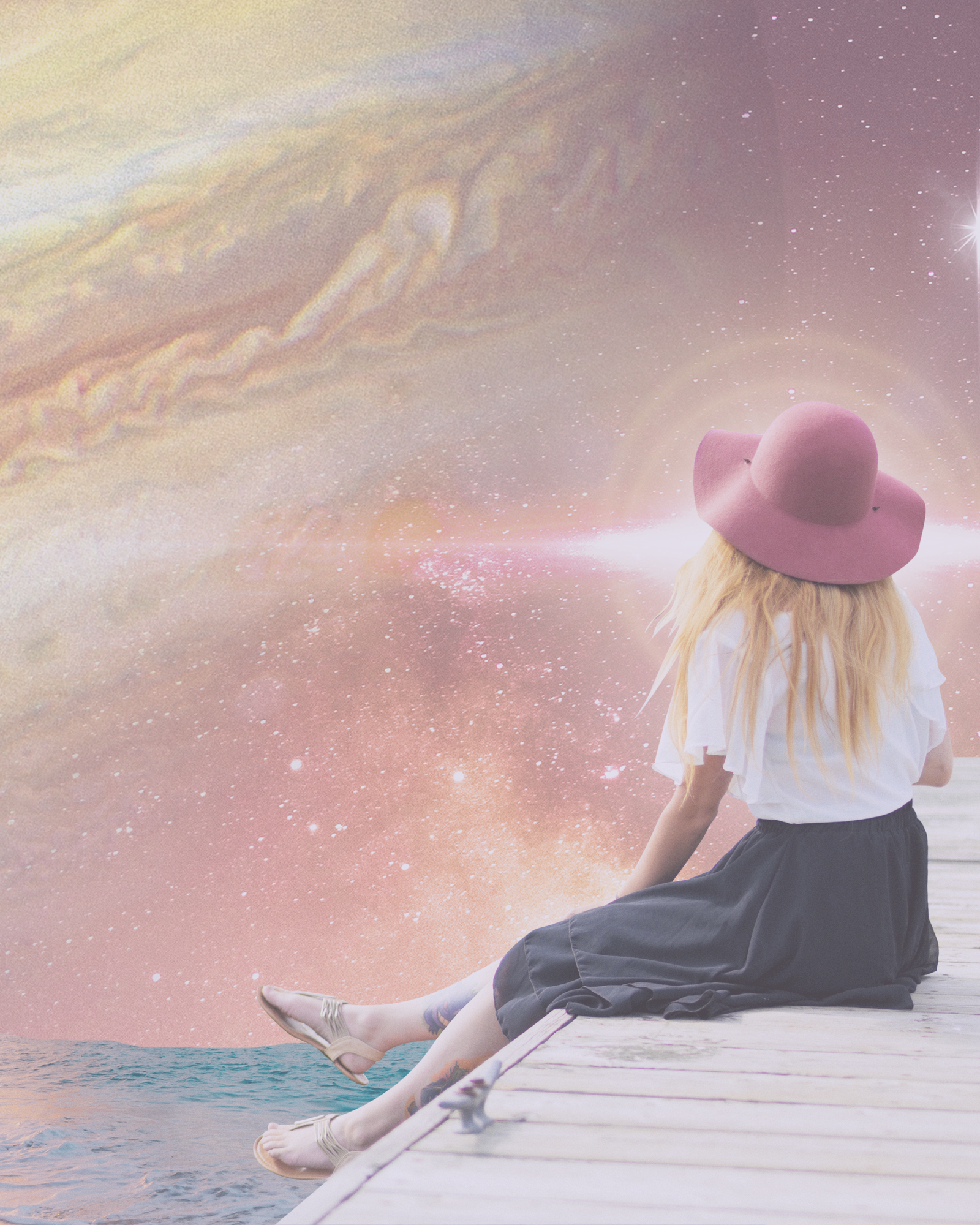 A girl with long blonde hair sitting on a dock by the water, wearing a pink wide-brimmed hat and white blouse, looking at a surreal cosmic background of stars and a large planet.