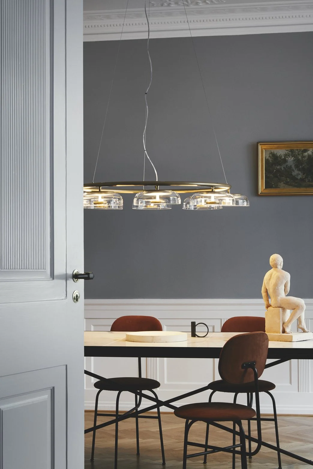 Nuura Blossi 8 pendant brass  and glass. Elegant for above the table 