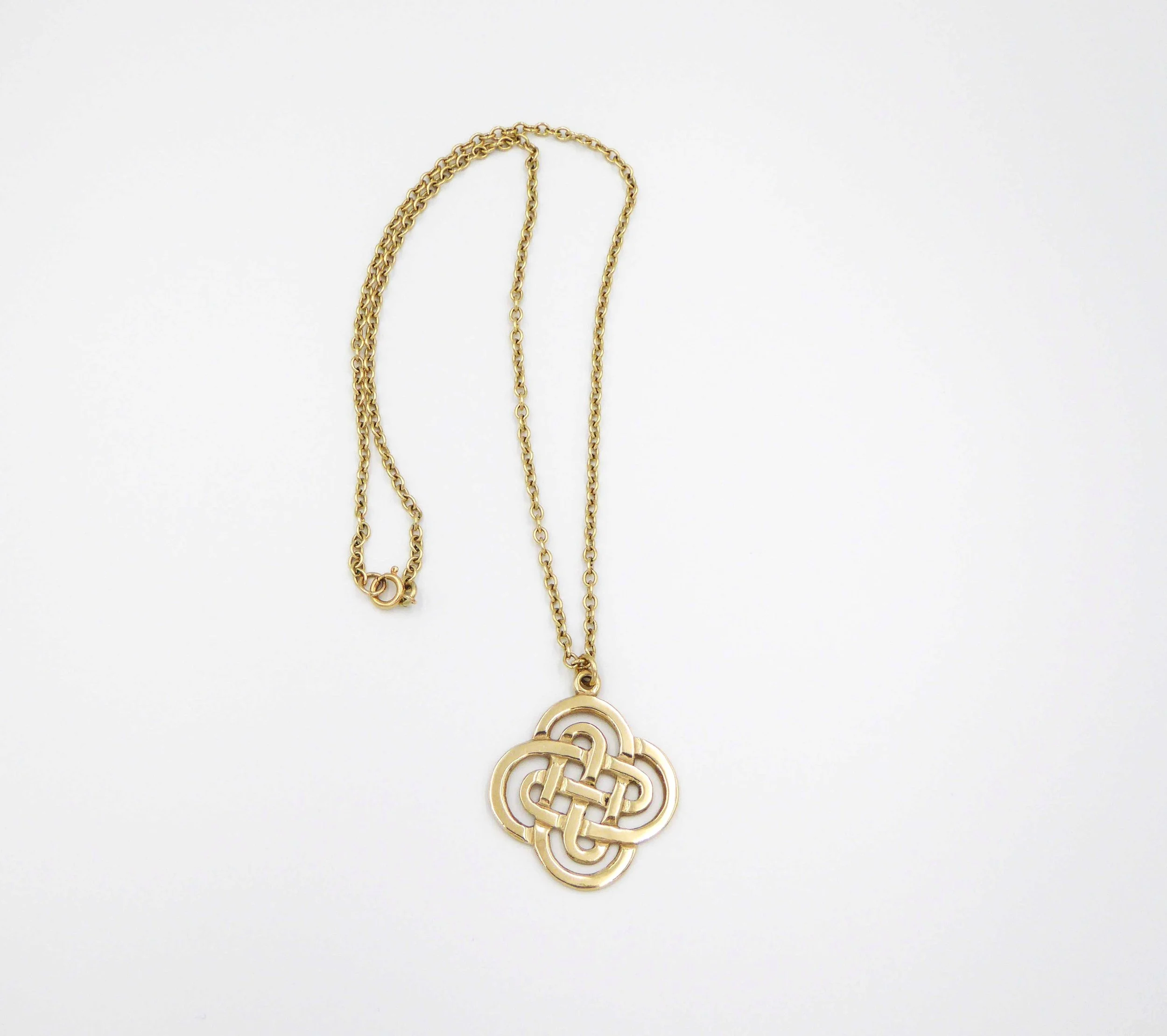 A Scottish gold Celtic knot pendant and chain by John Fraser, Inverness, hallmarked Edinburgh, 1992 - complete