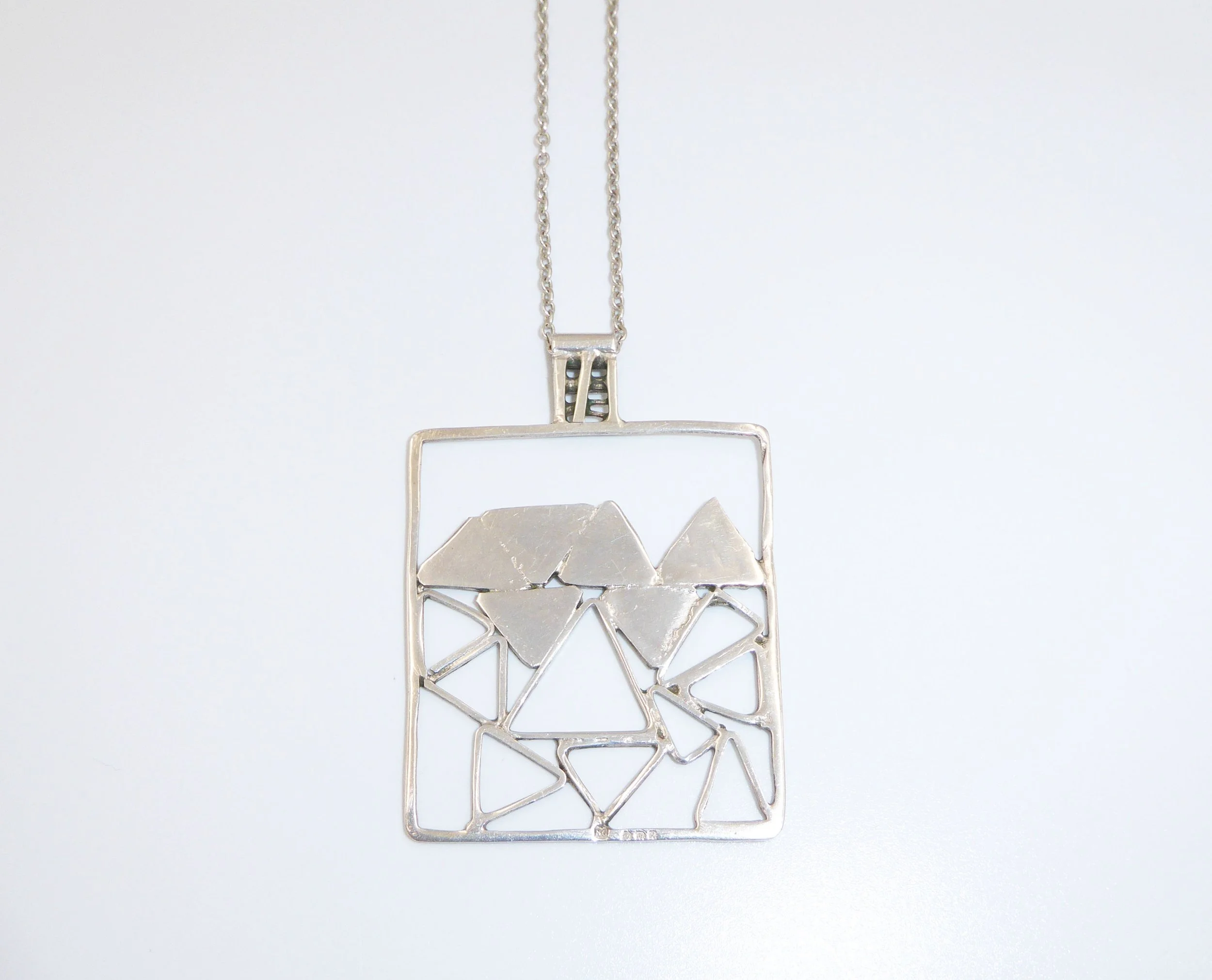 Silver and purple enamel pendant and chain by Norman Grant (1943-2017), hallmarked Edinburgh, 1973 - reverse