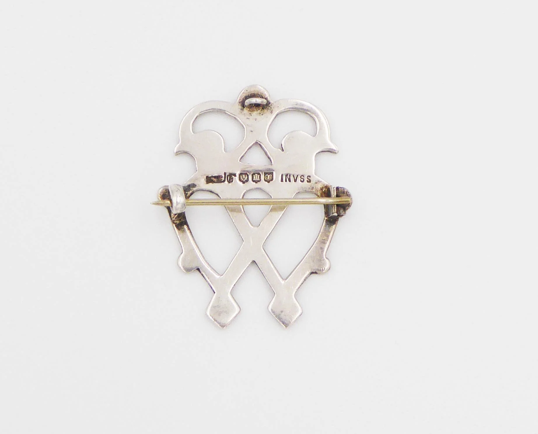 A Scottish silver luckenbooth (heart brooch) by Medlock & Craik, Inverness, hallmarked Edinburgh, 1953 - reverse