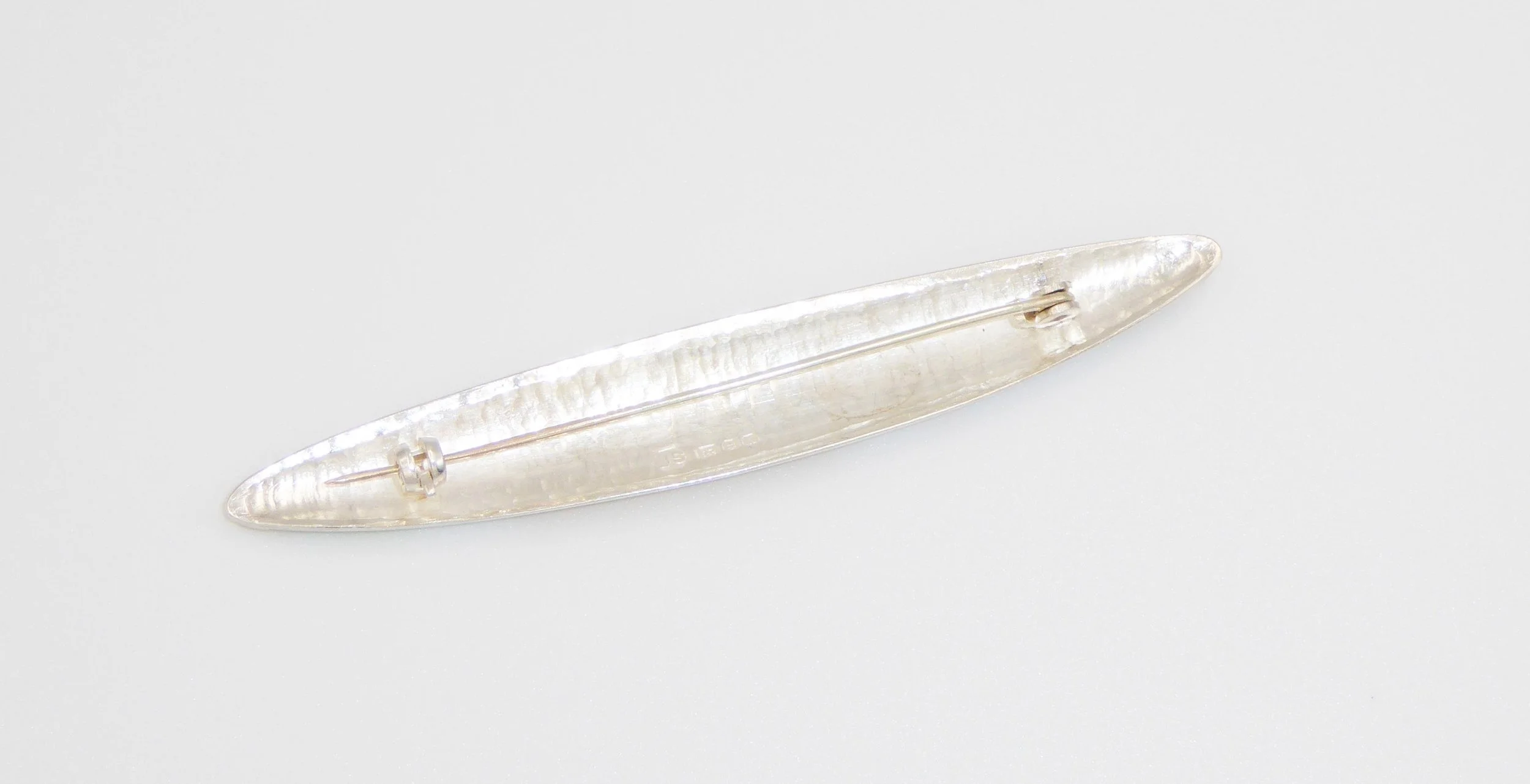 Silver and enamel brooch by Jane Short, hallmarked London, 1986 - reverse