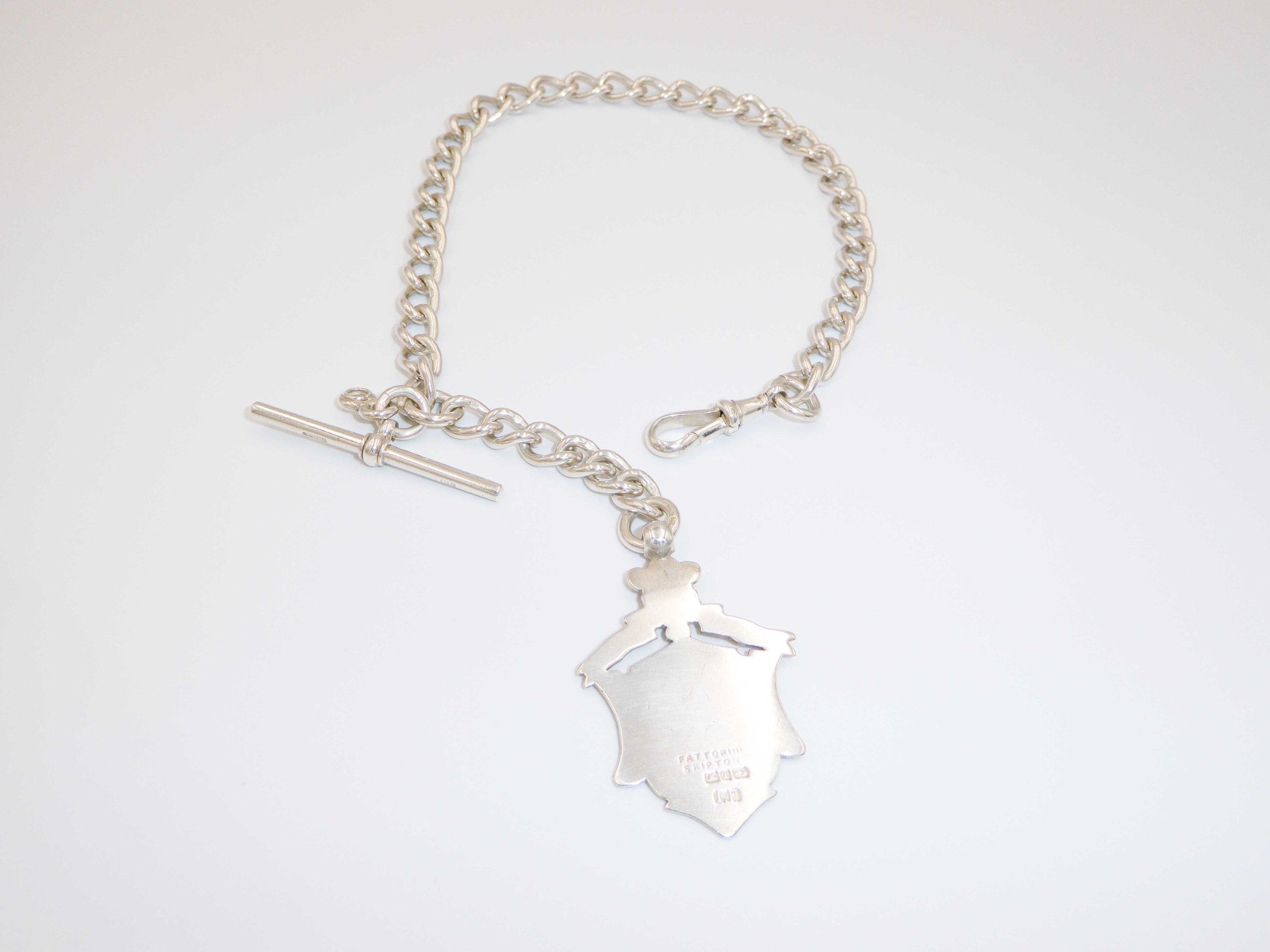 An Edwardian silver, single Albert pocket watch chain and fob, Birmingham, 1897-1906 - reverse