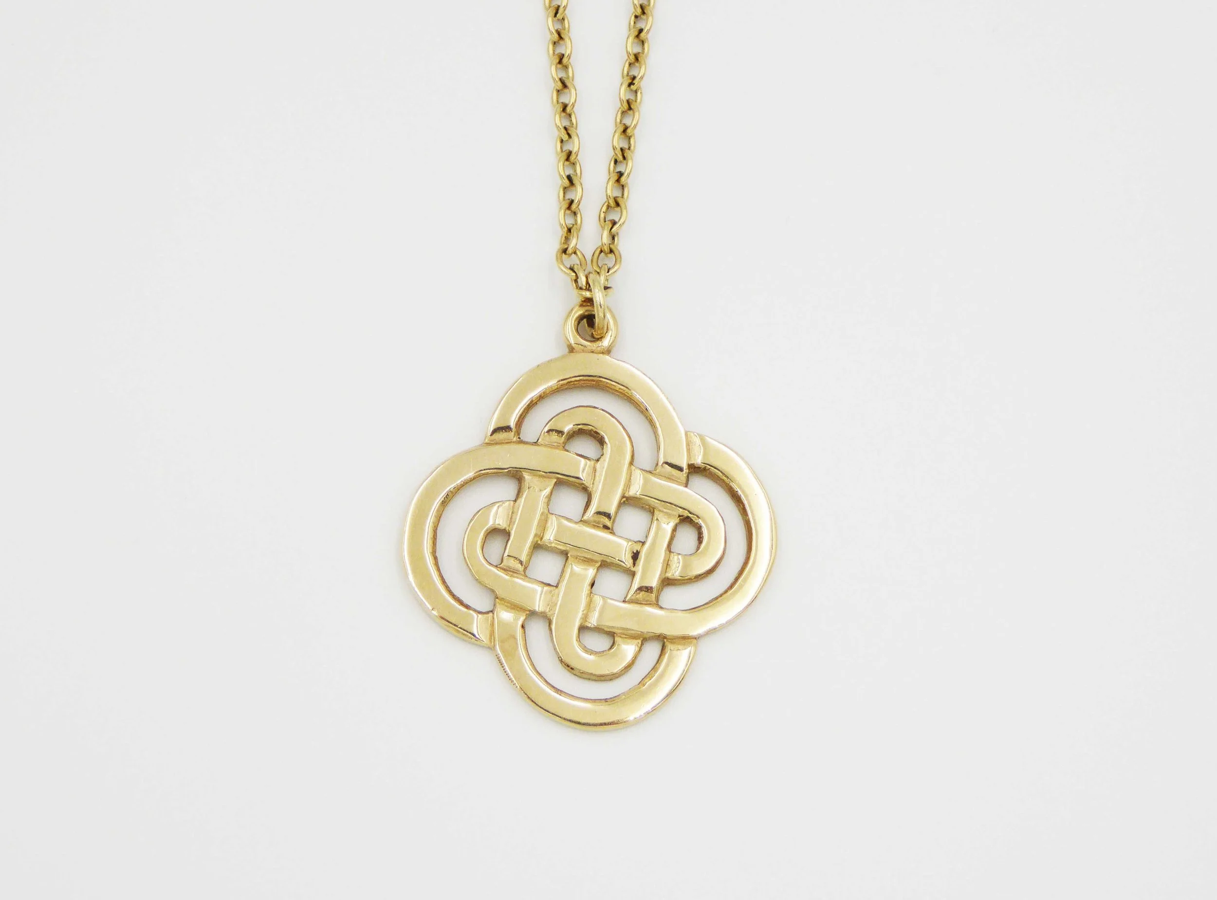 A Scottish gold Celtic knot pendant and chain by John Fraser, Inverness, hallmarked Edinburgh, 1992 - front