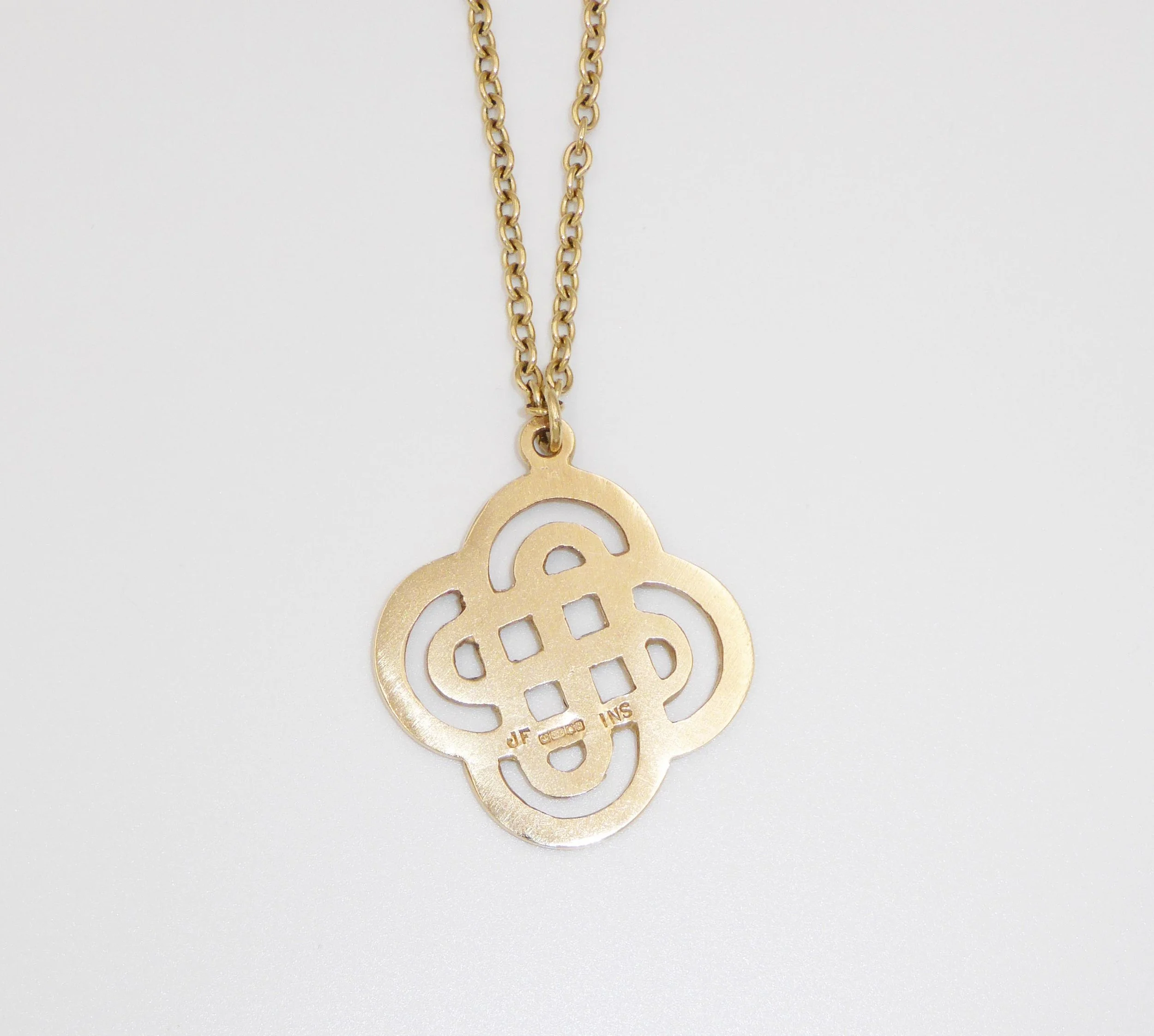 A Scottish gold Celtic knot pendant and chain by John Fraser, Inverness, hallmarked Edinburgh, 1992 - reverse