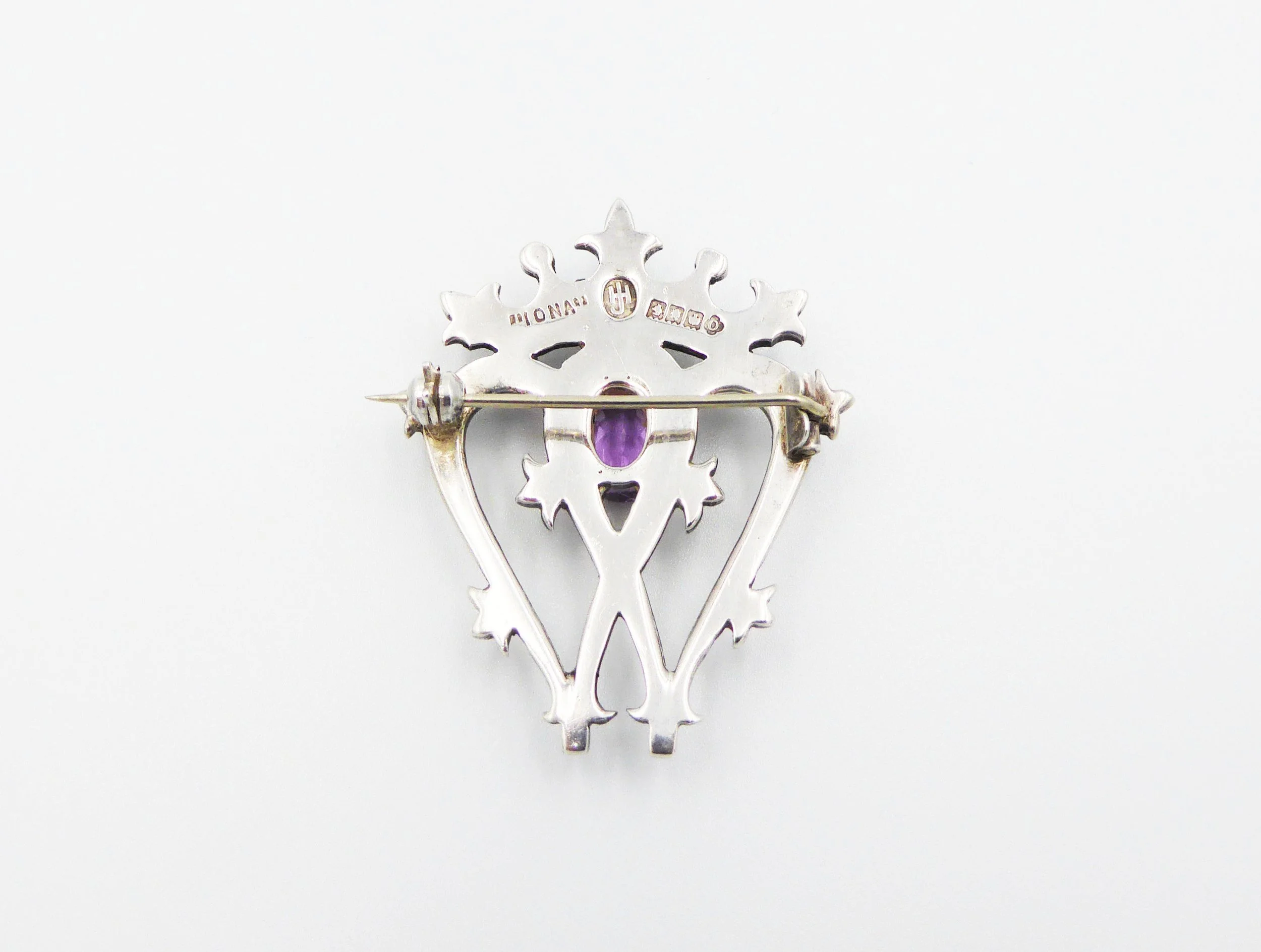 A Scottish silver and amethyst luckenbooth (heart brooch) by John Hart, Glasgow, 1961 - reverse