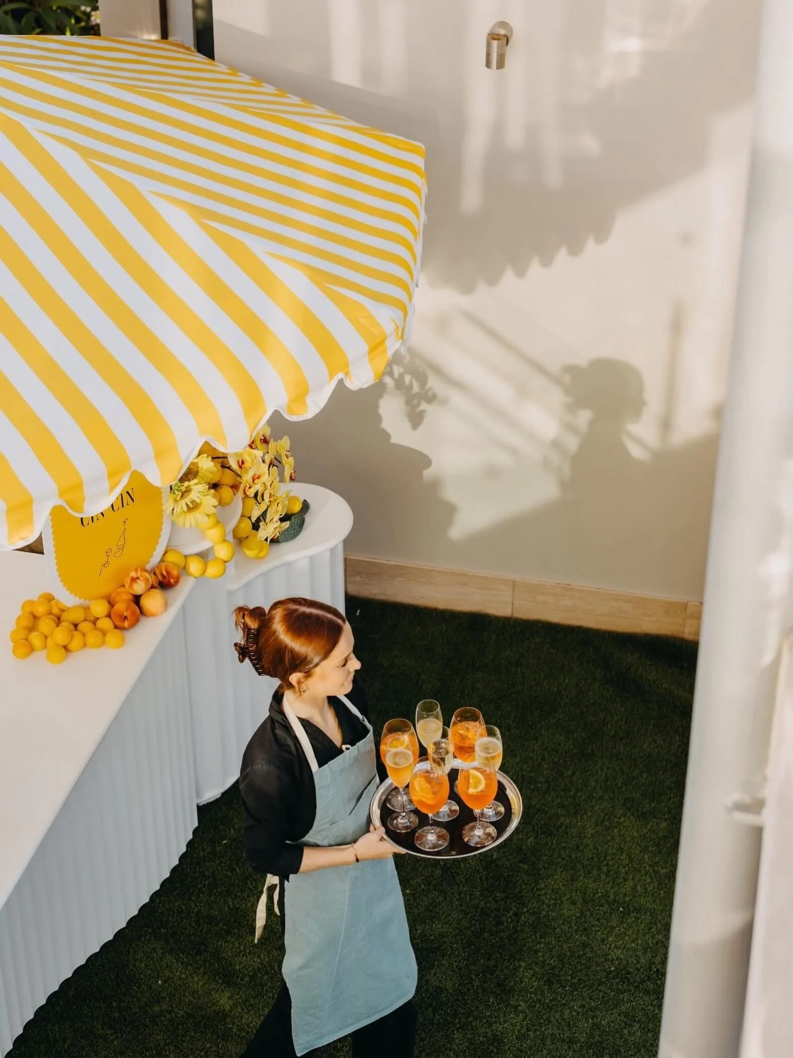 Dreaming of a summer Sunday and a tray of spritz ~ our yellow stripe market umbrella has us missing the sunshine 🍊
