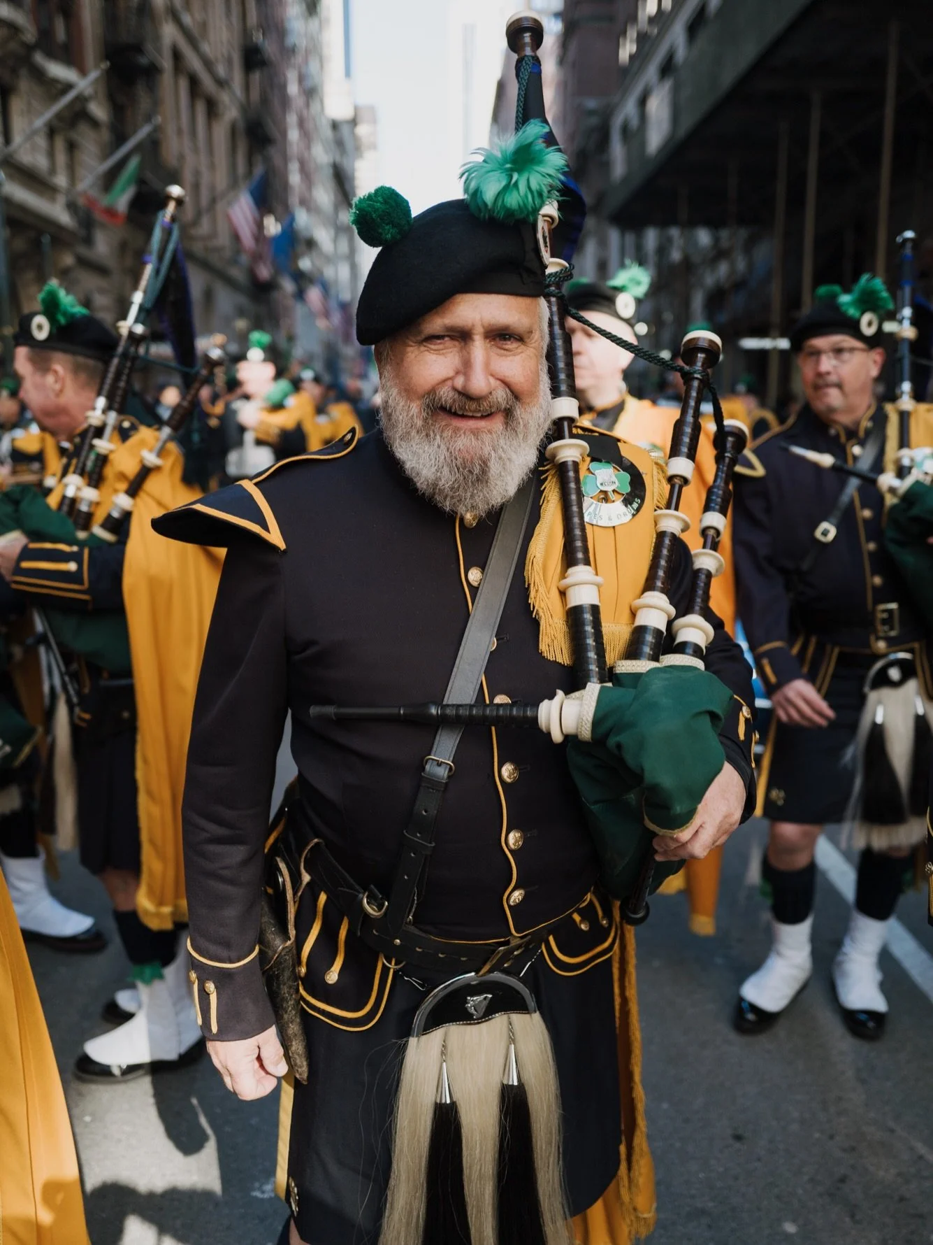 As a photographer, documenting this for the first time was incredible: the sea of green, the sound of the pipes, and those raw, authentic moments that happen between the crowds and the marchers.
I&rsquo;ve always believed in a documentary approach, j