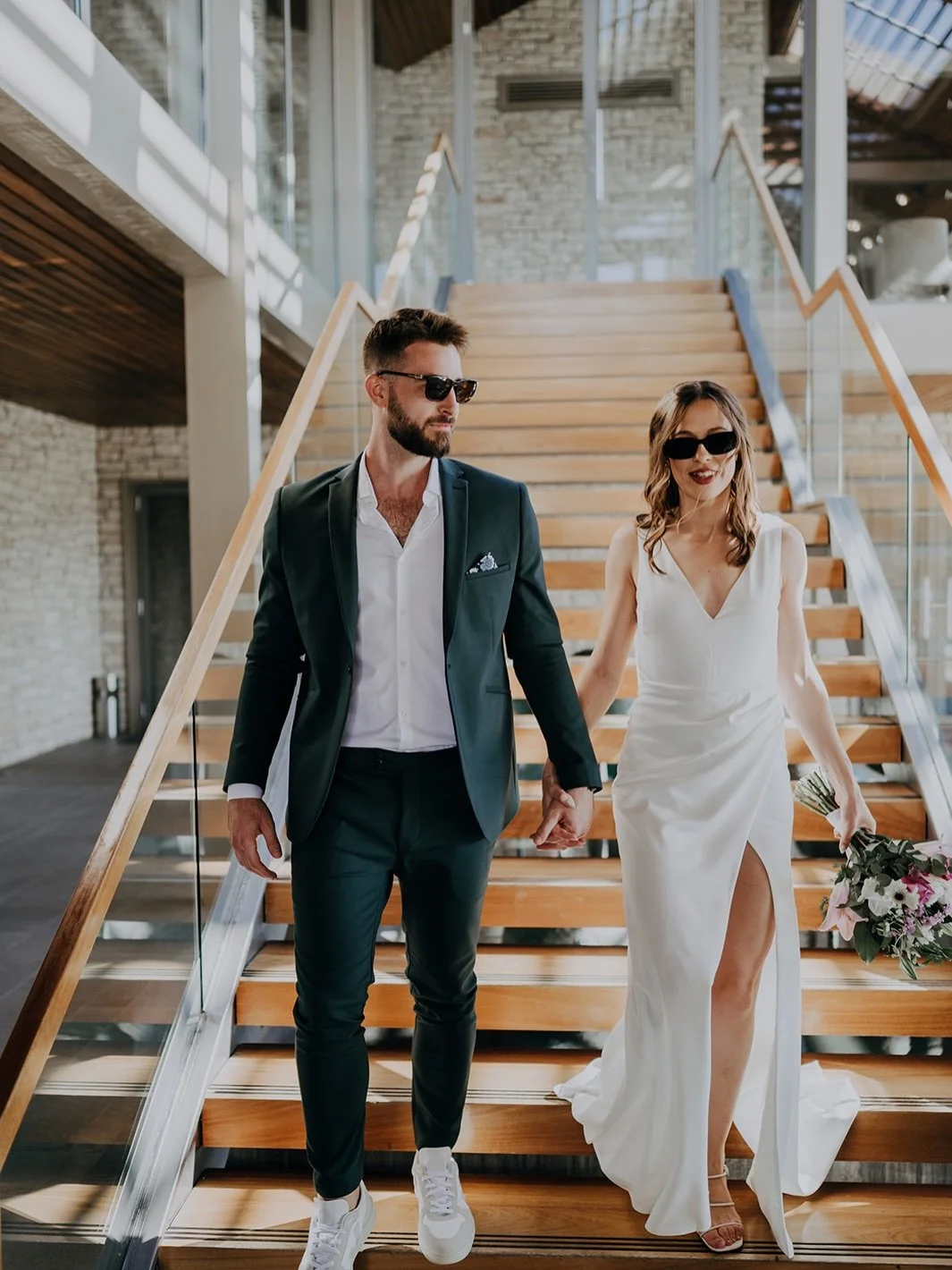 Here are some wedding day tips for breathtaking portraits:
1. Enjoy movement instead of posing rigidly; walk hand in hand, share laughter, and sway together. This playful activity will capture genuine, magical moments that reflect your unique love st